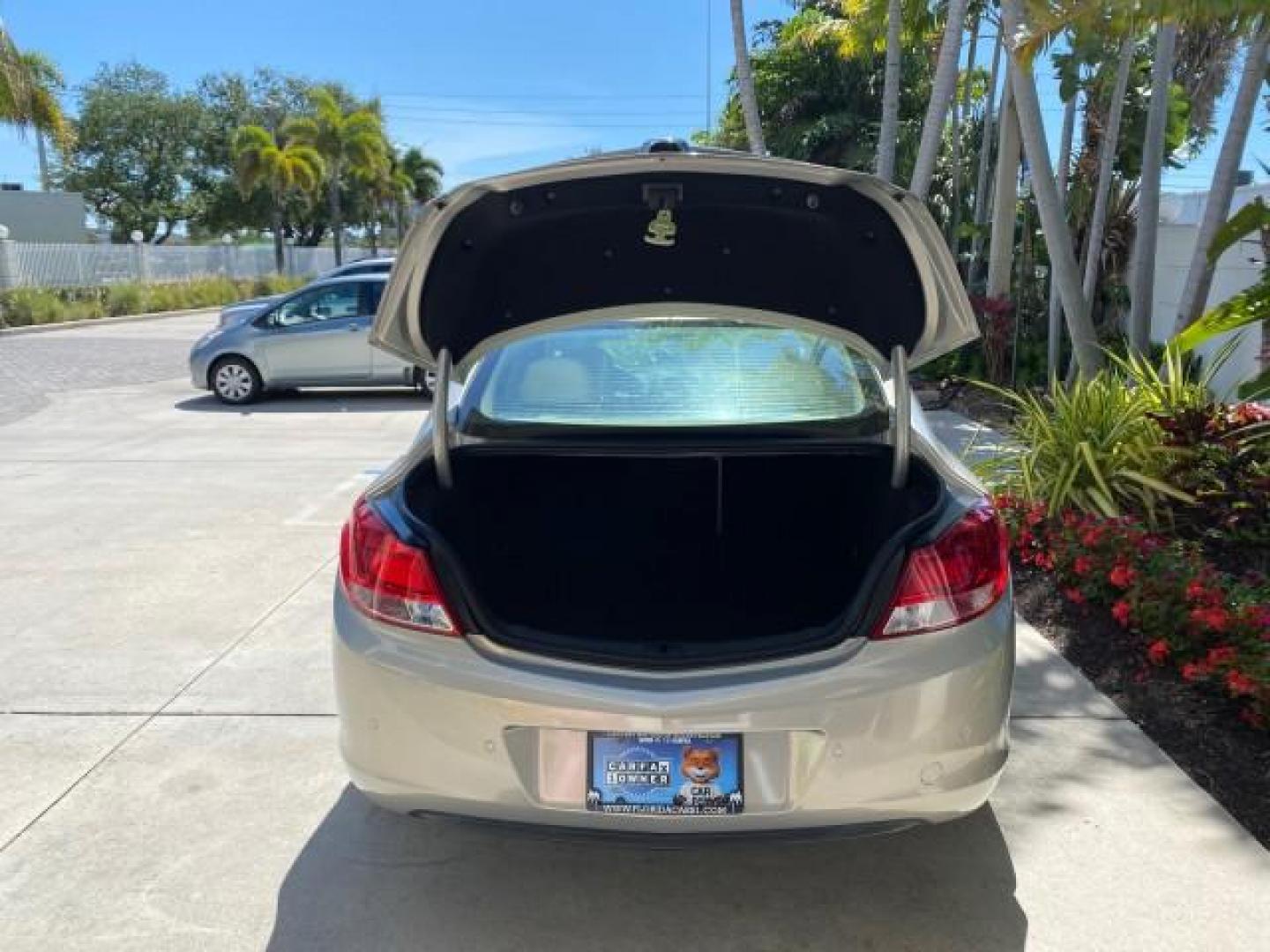 2011 Quicksilver Metallic /Cashmere Buick Regal SEDAN CXL LOW MILES 35,816 (W04GR5EC2B1) with an 2.4L Ecotec DOHC 4-Cyl SIDI Spark Ignition DI Engine engine, Automatic transmission, located at 4701 North Dixie Hwy, Pompano Beach, FL, 33064, (954) 422-2889, 26.240938, -80.123474 - OUR WEBPAGE FLORIDACARS1.COM HAS OVER 100 PHOTOS AND FREE CARFAX LINK 2011 Buick Regal CXL Sedan 4 DR 2.4L I4 F DOHC 16V Gasoline 30 MPG Front Wheel Drive Features ABS Brakes Air Conditioning Alloy Wheels AM/FM Stereo Automatic Transmission Auxiliary Audio Input Bluetooth Technology CD Audio Comfort- Photo#94