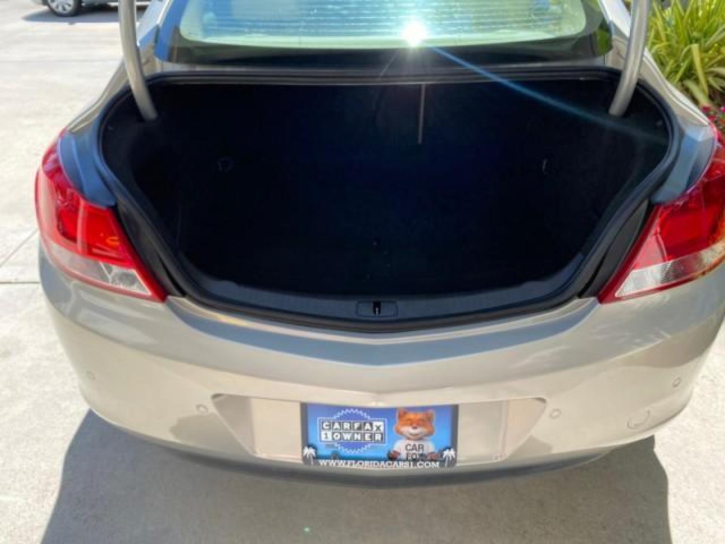 2011 Quicksilver Metallic /Cashmere Buick Regal SEDAN CXL LOW MILES 35,816 (W04GR5EC2B1) with an 2.4L Ecotec DOHC 4-Cyl SIDI Spark Ignition DI Engine engine, Automatic transmission, located at 4701 North Dixie Hwy, Pompano Beach, FL, 33064, (954) 422-2889, 26.240938, -80.123474 - OUR WEBPAGE FLORIDACARS1.COM HAS OVER 100 PHOTOS AND FREE CARFAX LINK 2011 Buick Regal CXL Sedan 4 DR 2.4L I4 F DOHC 16V Gasoline 30 MPG Front Wheel Drive Features ABS Brakes Air Conditioning Alloy Wheels AM/FM Stereo Automatic Transmission Auxiliary Audio Input Bluetooth Technology CD Audio Comfort- Photo#95
