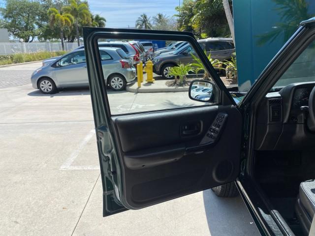2000 Forest Green Pearl /Agate Jeep Cherokee Sport 1 OWNER 4X4 AC 4.0 6YL (1J4FF48S2YL) with an 4.0L SMFI I6 Power Tech Engine engine, Automatic transmission, located at 4701 North Dixie Hwy, Pompano Beach, FL, 33064, (954) 422-2889, 26.240938, -80.123474 - OUR WEBPAGE FLORIDACARS1.COM HAS OVER 100 PHOTOS AND FREE CARFAX LINK 2000 Jeep Cherokee Sport 4WD 4x4 4 Door Wagon/Sport Utility 4.0L I6 F Gasoline 22 MPG All Wheel Drive Features 4WD/AWD ABS Brakes Air Conditioning AM/FM Stereo Automatic Transmission Cassette Player CD Audio Cloth Seats Cruise Con - Photo#9