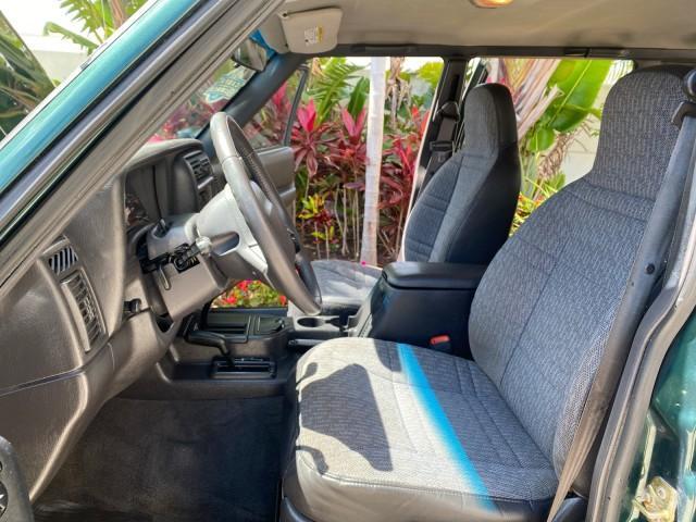 2000 Forest Green Pearl /Agate Jeep Cherokee Sport 1 OWNER 4X4 AC 4.0 6YL (1J4FF48S2YL) with an 4.0L SMFI I6 Power Tech Engine engine, Automatic transmission, located at 4701 North Dixie Hwy, Pompano Beach, FL, 33064, (954) 422-2889, 26.240938, -80.123474 - OUR WEBPAGE FLORIDACARS1.COM HAS OVER 100 PHOTOS AND FREE CARFAX LINK 2000 Jeep Cherokee Sport 4WD 4x4 4 Door Wagon/Sport Utility 4.0L I6 F Gasoline 22 MPG All Wheel Drive Features 4WD/AWD ABS Brakes Air Conditioning AM/FM Stereo Automatic Transmission Cassette Player CD Audio Cloth Seats Cruise Con - Photo#10