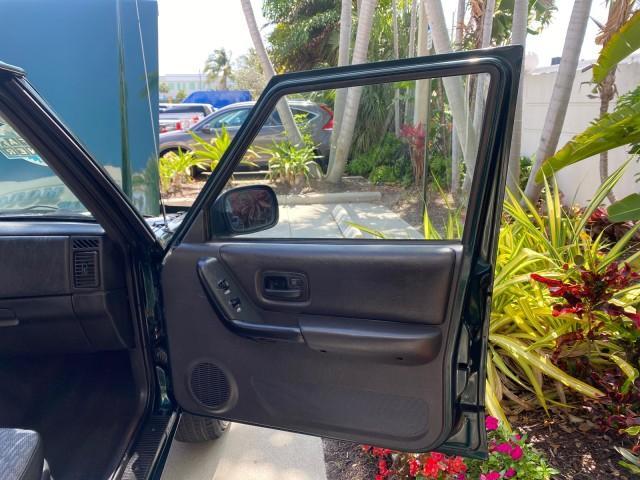 2000 Forest Green Pearl /Agate Jeep Cherokee Sport 1 OWNER 4X4 AC 4.0 6YL (1J4FF48S2YL) with an 4.0L SMFI I6 Power Tech Engine engine, Automatic transmission, located at 4701 North Dixie Hwy, Pompano Beach, FL, 33064, (954) 422-2889, 26.240938, -80.123474 - OUR WEBPAGE FLORIDACARS1.COM HAS OVER 100 PHOTOS AND FREE CARFAX LINK 2000 Jeep Cherokee Sport 4WD 4x4 4 Door Wagon/Sport Utility 4.0L I6 F Gasoline 22 MPG All Wheel Drive Features 4WD/AWD ABS Brakes Air Conditioning AM/FM Stereo Automatic Transmission Cassette Player CD Audio Cloth Seats Cruise Con - Photo#11