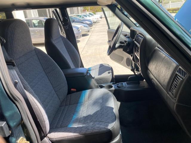 2000 Forest Green Pearl /Agate Jeep Cherokee Sport 1 OWNER 4X4 AC 4.0 6YL (1J4FF48S2YL) with an 4.0L SMFI I6 Power Tech Engine engine, Automatic transmission, located at 4701 North Dixie Hwy, Pompano Beach, FL, 33064, (954) 422-2889, 26.240938, -80.123474 - OUR WEBPAGE FLORIDACARS1.COM HAS OVER 100 PHOTOS AND FREE CARFAX LINK 2000 Jeep Cherokee Sport 4WD 4x4 4 Door Wagon/Sport Utility 4.0L I6 F Gasoline 22 MPG All Wheel Drive Features 4WD/AWD ABS Brakes Air Conditioning AM/FM Stereo Automatic Transmission Cassette Player CD Audio Cloth Seats Cruise Con - Photo#12