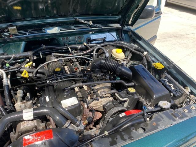 2000 Forest Green Pearl /Agate Jeep Cherokee Sport 1 OWNER 4X4 AC 4.0 6YL (1J4FF48S2YL) with an 4.0L SMFI I6 Power Tech Engine engine, Automatic transmission, located at 4701 North Dixie Hwy, Pompano Beach, FL, 33064, (954) 422-2889, 26.240938, -80.123474 - OUR WEBPAGE FLORIDACARS1.COM HAS OVER 100 PHOTOS AND FREE CARFAX LINK 2000 Jeep Cherokee Sport 4WD 4x4 4 Door Wagon/Sport Utility 4.0L I6 F Gasoline 22 MPG All Wheel Drive Features 4WD/AWD ABS Brakes Air Conditioning AM/FM Stereo Automatic Transmission Cassette Player CD Audio Cloth Seats Cruise Con - Photo#25