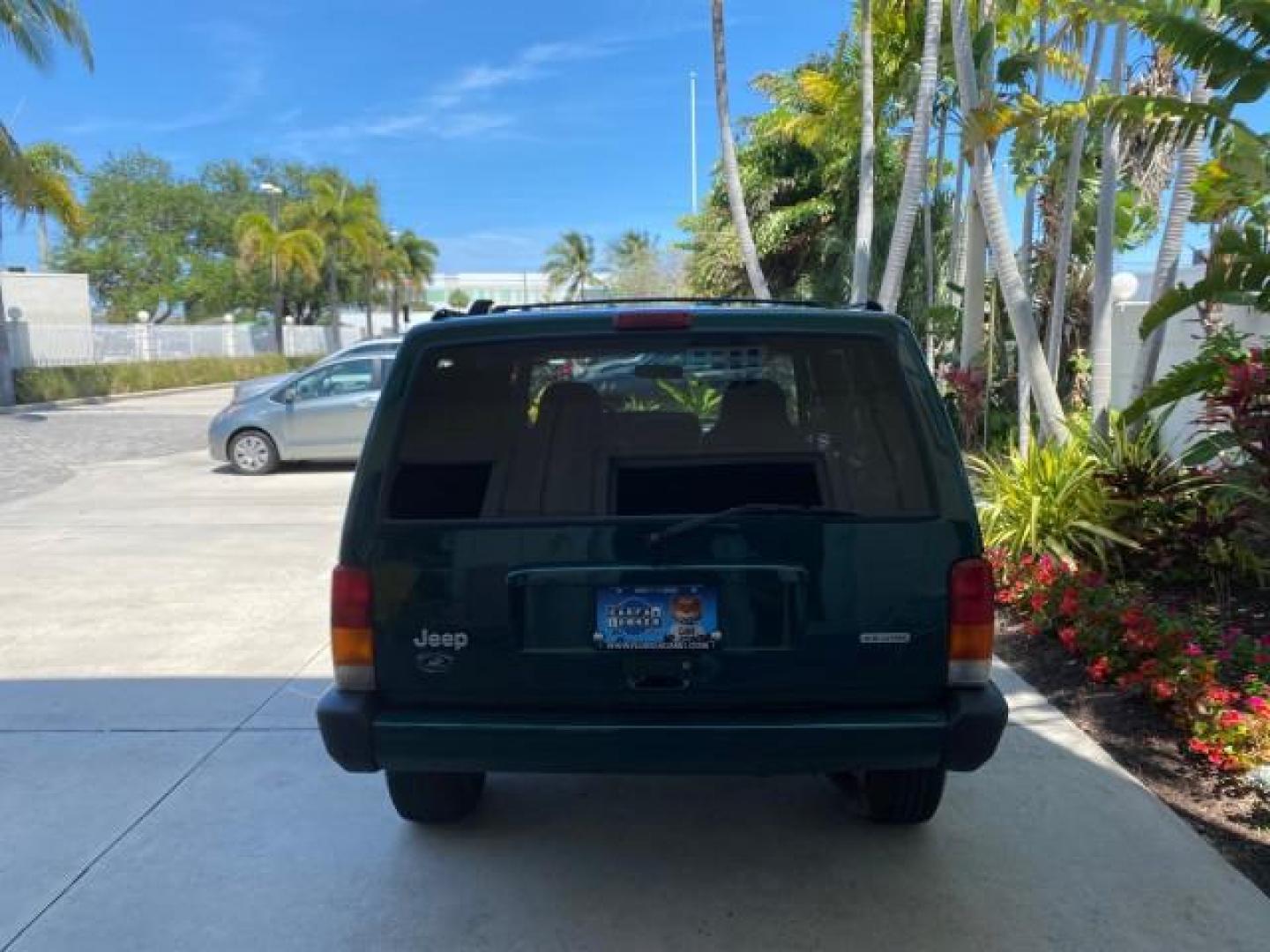 2000 Forest Green Pearl /Agate Jeep Cherokee Sport 1 OWNER 4X4 AC 4.0 6YL (1J4FF48S2YL) with an 4.0L SMFI I6 Power Tech Engine engine, Automatic transmission, located at 4701 North Dixie Hwy, Pompano Beach, FL, 33064, (954) 422-2889, 26.240938, -80.123474 - OUR WEBPAGE FLORIDACARS1.COM HAS OVER 100 PHOTOS AND FREE CARFAX LINK 2000 Jeep Cherokee Sport 4WD 4x4 4 Door Wagon/Sport Utility 4.0L I6 F Gasoline 22 MPG All Wheel Drive Features 4WD/AWD ABS Brakes Air Conditioning AM/FM Stereo Automatic Transmission Cassette Player CD Audio Cloth Seats Cruise Con - Photo#34