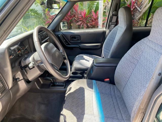 2000 Forest Green Pearl /Agate Jeep Cherokee Sport 1 OWNER 4X4 AC 4.0 6YL (1J4FF48S2YL) with an 4.0L SMFI I6 Power Tech Engine engine, Automatic transmission, located at 4701 North Dixie Hwy, Pompano Beach, FL, 33064, (954) 422-2889, 26.240938, -80.123474 - OUR WEBPAGE FLORIDACARS1.COM HAS OVER 100 PHOTOS AND FREE CARFAX LINK 2000 Jeep Cherokee Sport 4WD 4x4 4 Door Wagon/Sport Utility 4.0L I6 F Gasoline 22 MPG All Wheel Drive Features 4WD/AWD ABS Brakes Air Conditioning AM/FM Stereo Automatic Transmission Cassette Player CD Audio Cloth Seats Cruise Con - Photo#44