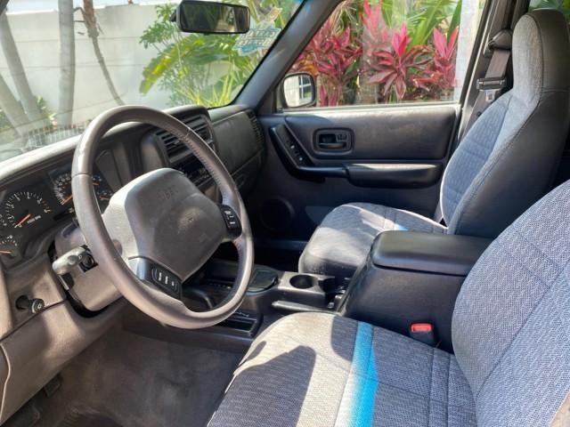 2000 Forest Green Pearl /Agate Jeep Cherokee Sport 1 OWNER 4X4 AC 4.0 6YL (1J4FF48S2YL) with an 4.0L SMFI I6 Power Tech Engine engine, Automatic transmission, located at 4701 North Dixie Hwy, Pompano Beach, FL, 33064, (954) 422-2889, 26.240938, -80.123474 - OUR WEBPAGE FLORIDACARS1.COM HAS OVER 100 PHOTOS AND FREE CARFAX LINK 2000 Jeep Cherokee Sport 4WD 4x4 4 Door Wagon/Sport Utility 4.0L I6 F Gasoline 22 MPG All Wheel Drive Features 4WD/AWD ABS Brakes Air Conditioning AM/FM Stereo Automatic Transmission Cassette Player CD Audio Cloth Seats Cruise Con - Photo#45