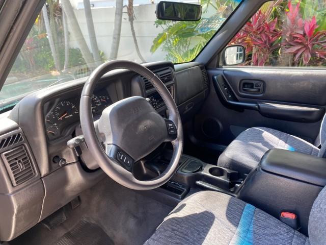 2000 Forest Green Pearl /Agate Jeep Cherokee Sport 1 OWNER 4X4 AC 4.0 6YL (1J4FF48S2YL) with an 4.0L SMFI I6 Power Tech Engine engine, Automatic transmission, located at 4701 North Dixie Hwy, Pompano Beach, FL, 33064, (954) 422-2889, 26.240938, -80.123474 - OUR WEBPAGE FLORIDACARS1.COM HAS OVER 100 PHOTOS AND FREE CARFAX LINK 2000 Jeep Cherokee Sport 4WD 4x4 4 Door Wagon/Sport Utility 4.0L I6 F Gasoline 22 MPG All Wheel Drive Features 4WD/AWD ABS Brakes Air Conditioning AM/FM Stereo Automatic Transmission Cassette Player CD Audio Cloth Seats Cruise Con - Photo#46