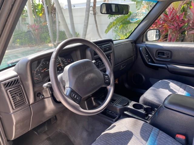 2000 Forest Green Pearl /Agate Jeep Cherokee Sport 1 OWNER 4X4 AC 4.0 6YL (1J4FF48S2YL) with an 4.0L SMFI I6 Power Tech Engine engine, Automatic transmission, located at 4701 North Dixie Hwy, Pompano Beach, FL, 33064, (954) 422-2889, 26.240938, -80.123474 - OUR WEBPAGE FLORIDACARS1.COM HAS OVER 100 PHOTOS AND FREE CARFAX LINK 2000 Jeep Cherokee Sport 4WD 4x4 4 Door Wagon/Sport Utility 4.0L I6 F Gasoline 22 MPG All Wheel Drive Features 4WD/AWD ABS Brakes Air Conditioning AM/FM Stereo Automatic Transmission Cassette Player CD Audio Cloth Seats Cruise Con - Photo#47