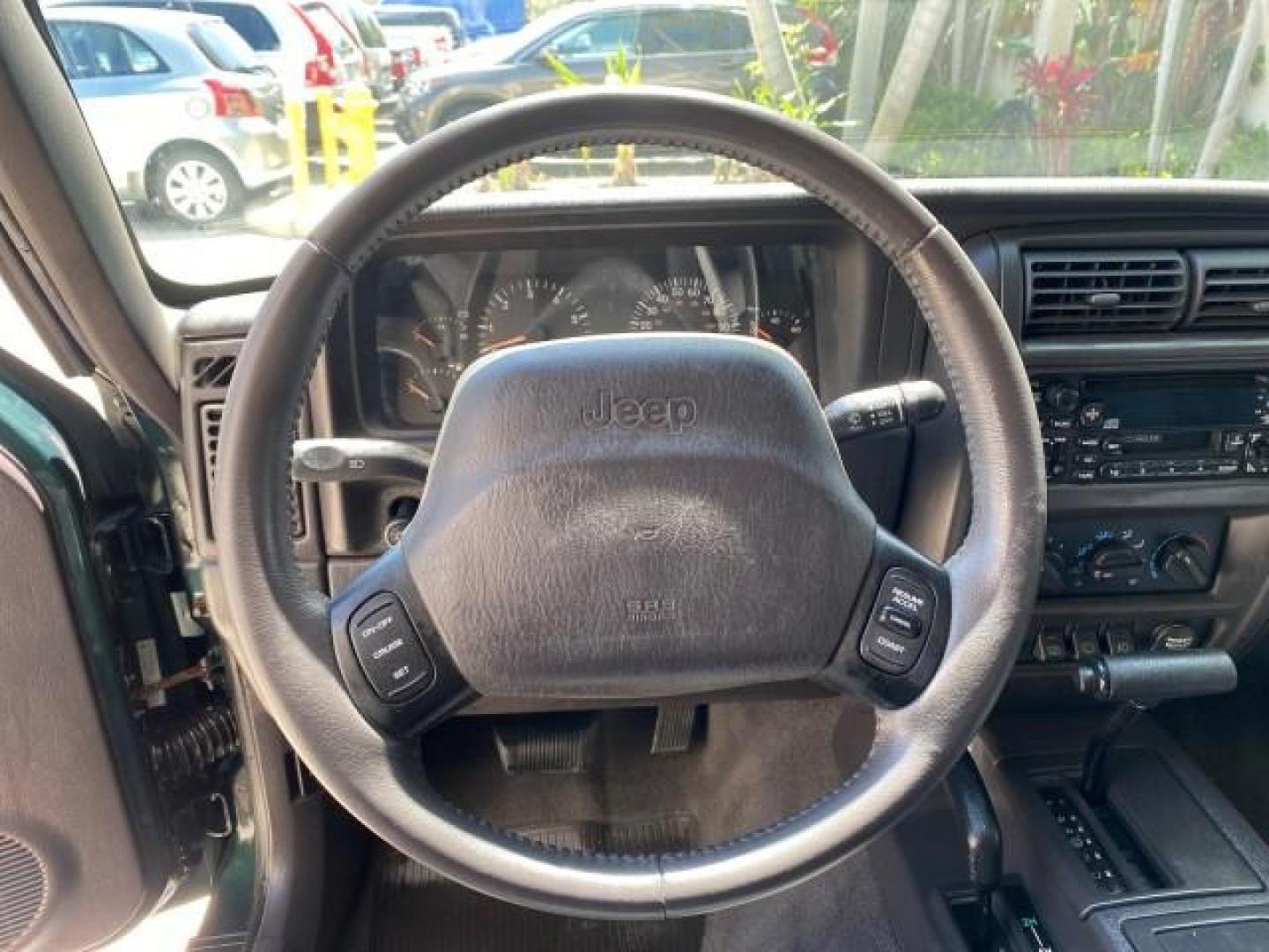 2000 Forest Green Pearl /Agate Jeep Cherokee Sport 1 OWNER 4X4 AC 4.0 6YL (1J4FF48S2YL) with an 4.0L SMFI I6 Power Tech Engine engine, Automatic transmission, located at 4701 North Dixie Hwy, Pompano Beach, FL, 33064, (954) 422-2889, 26.240938, -80.123474 - OUR WEBPAGE FLORIDACARS1.COM HAS OVER 100 PHOTOS AND FREE CARFAX LINK 2000 Jeep Cherokee Sport 4WD 4x4 4 Door Wagon/Sport Utility 4.0L I6 F Gasoline 22 MPG All Wheel Drive Features 4WD/AWD ABS Brakes Air Conditioning AM/FM Stereo Automatic Transmission Cassette Player CD Audio Cloth Seats Cruise Con - Photo#48