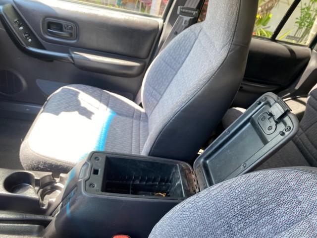 2000 Forest Green Pearl /Agate Jeep Cherokee Sport 1 OWNER 4X4 AC 4.0 6YL (1J4FF48S2YL) with an 4.0L SMFI I6 Power Tech Engine engine, Automatic transmission, located at 4701 North Dixie Hwy, Pompano Beach, FL, 33064, (954) 422-2889, 26.240938, -80.123474 - OUR WEBPAGE FLORIDACARS1.COM HAS OVER 100 PHOTOS AND FREE CARFAX LINK 2000 Jeep Cherokee Sport 4WD 4x4 4 Door Wagon/Sport Utility 4.0L I6 F Gasoline 22 MPG All Wheel Drive Features 4WD/AWD ABS Brakes Air Conditioning AM/FM Stereo Automatic Transmission Cassette Player CD Audio Cloth Seats Cruise Con - Photo#68