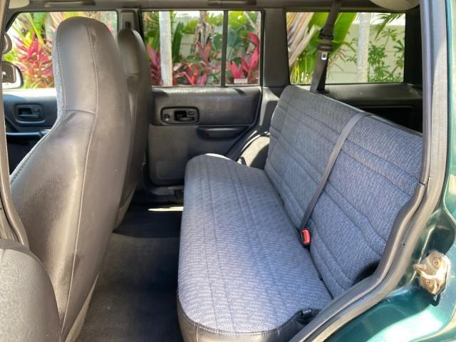 2000 Forest Green Pearl /Agate Jeep Cherokee Sport 1 OWNER 4X4 AC 4.0 6YL (1J4FF48S2YL) with an 4.0L SMFI I6 Power Tech Engine engine, Automatic transmission, located at 4701 North Dixie Hwy, Pompano Beach, FL, 33064, (954) 422-2889, 26.240938, -80.123474 - OUR WEBPAGE FLORIDACARS1.COM HAS OVER 100 PHOTOS AND FREE CARFAX LINK 2000 Jeep Cherokee Sport 4WD 4x4 4 Door Wagon/Sport Utility 4.0L I6 F Gasoline 22 MPG All Wheel Drive Features 4WD/AWD ABS Brakes Air Conditioning AM/FM Stereo Automatic Transmission Cassette Player CD Audio Cloth Seats Cruise Con - Photo#78