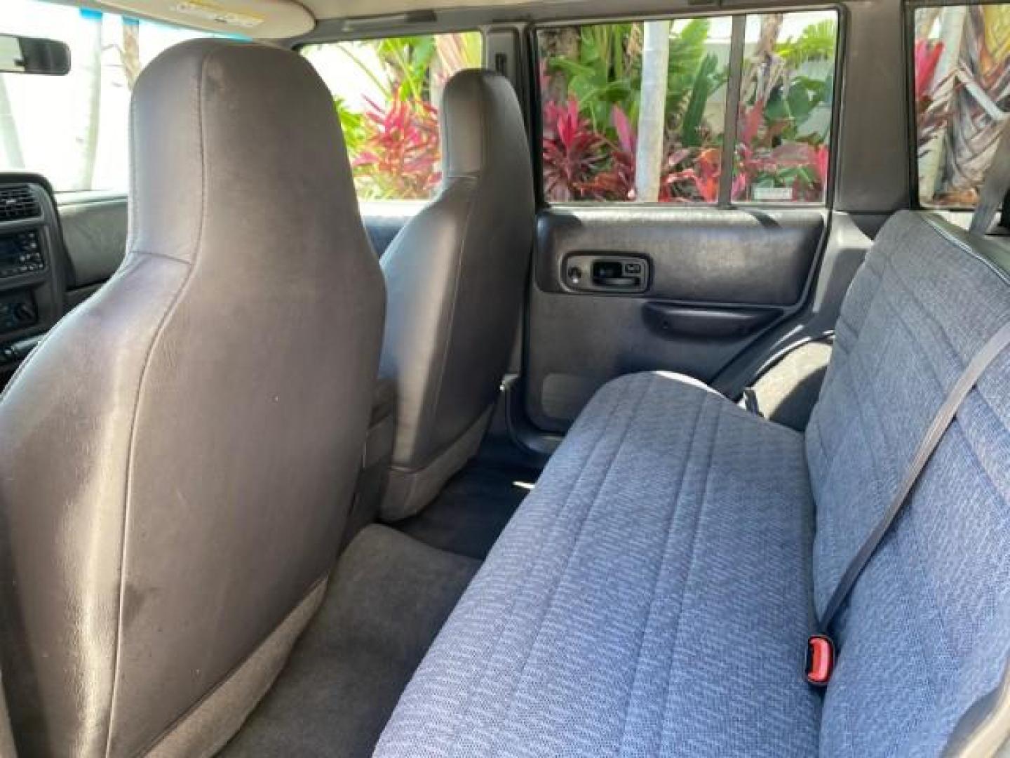 2000 Forest Green Pearl /Agate Jeep Cherokee Sport 1 OWNER 4X4 AC 4.0 6YL (1J4FF48S2YL) with an 4.0L SMFI I6 Power Tech Engine engine, Automatic transmission, located at 4701 North Dixie Hwy, Pompano Beach, FL, 33064, (954) 422-2889, 26.240938, -80.123474 - OUR WEBPAGE FLORIDACARS1.COM HAS OVER 100 PHOTOS AND FREE CARFAX LINK 2000 Jeep Cherokee Sport 4WD 4x4 4 Door Wagon/Sport Utility 4.0L I6 F Gasoline 22 MPG All Wheel Drive Features 4WD/AWD ABS Brakes Air Conditioning AM/FM Stereo Automatic Transmission Cassette Player CD Audio Cloth Seats Cruise Con - Photo#80