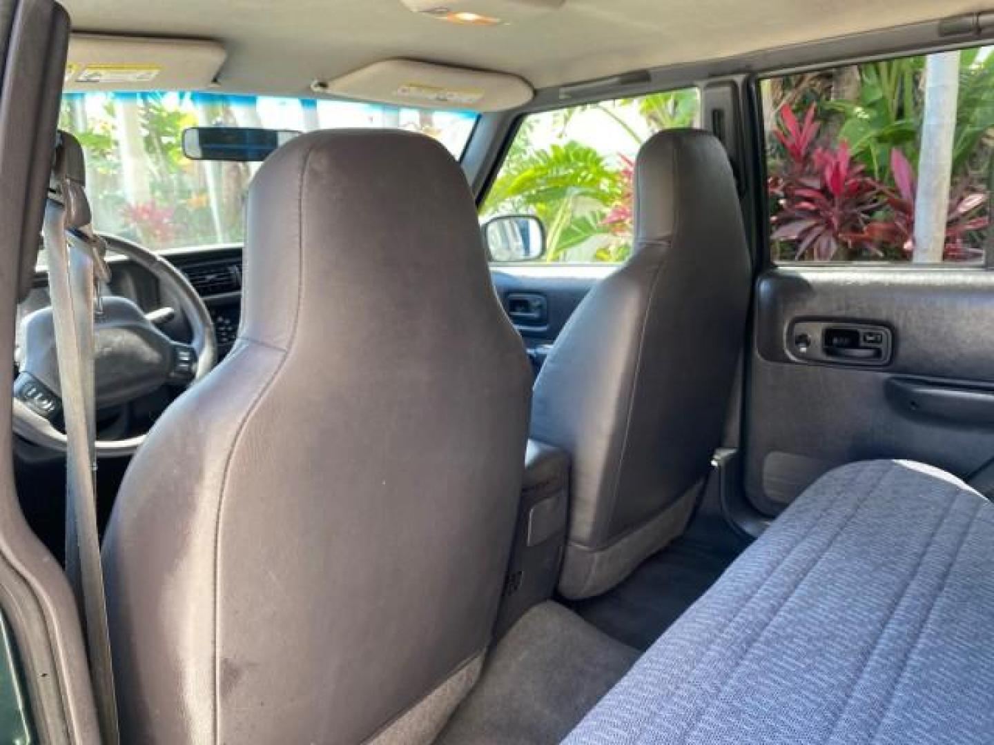 2000 Forest Green Pearl /Agate Jeep Cherokee Sport 1 OWNER 4X4 AC 4.0 6YL (1J4FF48S2YL) with an 4.0L SMFI I6 Power Tech Engine engine, Automatic transmission, located at 4701 North Dixie Hwy, Pompano Beach, FL, 33064, (954) 422-2889, 26.240938, -80.123474 - OUR WEBPAGE FLORIDACARS1.COM HAS OVER 100 PHOTOS AND FREE CARFAX LINK 2000 Jeep Cherokee Sport 4WD 4x4 4 Door Wagon/Sport Utility 4.0L I6 F Gasoline 22 MPG All Wheel Drive Features 4WD/AWD ABS Brakes Air Conditioning AM/FM Stereo Automatic Transmission Cassette Player CD Audio Cloth Seats Cruise Con - Photo#82