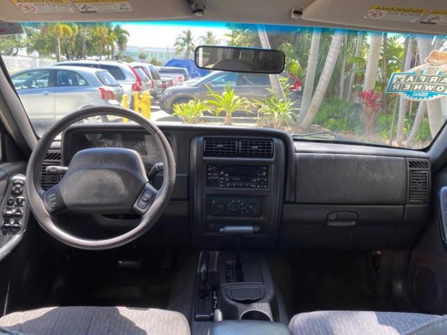 2000 Forest Green Pearl /Agate Jeep Cherokee Sport 1 OWNER 4X4 AC 4.0 6YL (1J4FF48S2YL) with an 4.0L SMFI I6 Power Tech Engine engine, Automatic transmission, located at 4701 North Dixie Hwy, Pompano Beach, FL, 33064, (954) 422-2889, 26.240938, -80.123474 - OUR WEBPAGE FLORIDACARS1.COM HAS OVER 100 PHOTOS AND FREE CARFAX LINK 2000 Jeep Cherokee Sport 4WD 4x4 4 Door Wagon/Sport Utility 4.0L I6 F Gasoline 22 MPG All Wheel Drive Features 4WD/AWD ABS Brakes Air Conditioning AM/FM Stereo Automatic Transmission Cassette Player CD Audio Cloth Seats Cruise Con - Photo#84