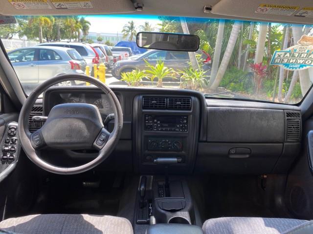 2000 Forest Green Pearl /Agate Jeep Cherokee Sport 1 OWNER 4X4 AC 4.0 6YL (1J4FF48S2YL) with an 4.0L SMFI I6 Power Tech Engine engine, Automatic transmission, located at 4701 North Dixie Hwy, Pompano Beach, FL, 33064, (954) 422-2889, 26.240938, -80.123474 - OUR WEBPAGE FLORIDACARS1.COM HAS OVER 100 PHOTOS AND FREE CARFAX LINK 2000 Jeep Cherokee Sport 4WD 4x4 4 Door Wagon/Sport Utility 4.0L I6 F Gasoline 22 MPG All Wheel Drive Features 4WD/AWD ABS Brakes Air Conditioning AM/FM Stereo Automatic Transmission Cassette Player CD Audio Cloth Seats Cruise Con - Photo#84