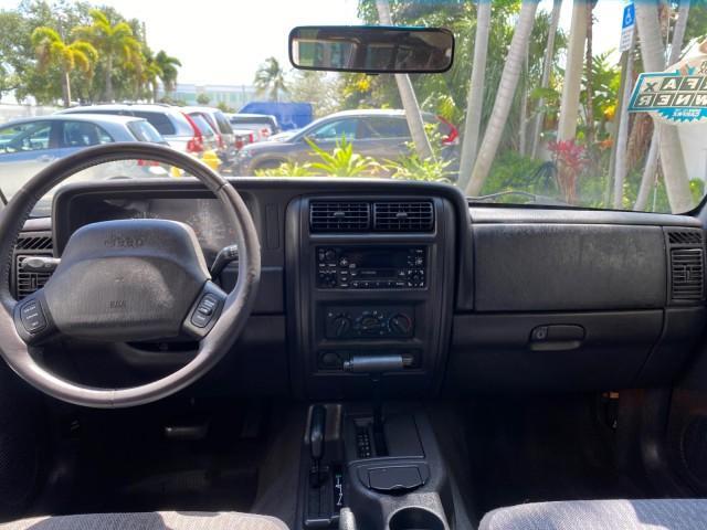 2000 Forest Green Pearl /Agate Jeep Cherokee Sport 1 OWNER 4X4 AC 4.0 6YL (1J4FF48S2YL) with an 4.0L SMFI I6 Power Tech Engine engine, Automatic transmission, located at 4701 North Dixie Hwy, Pompano Beach, FL, 33064, (954) 422-2889, 26.240938, -80.123474 - OUR WEBPAGE FLORIDACARS1.COM HAS OVER 100 PHOTOS AND FREE CARFAX LINK 2000 Jeep Cherokee Sport 4WD 4x4 4 Door Wagon/Sport Utility 4.0L I6 F Gasoline 22 MPG All Wheel Drive Features 4WD/AWD ABS Brakes Air Conditioning AM/FM Stereo Automatic Transmission Cassette Player CD Audio Cloth Seats Cruise Con - Photo#86
