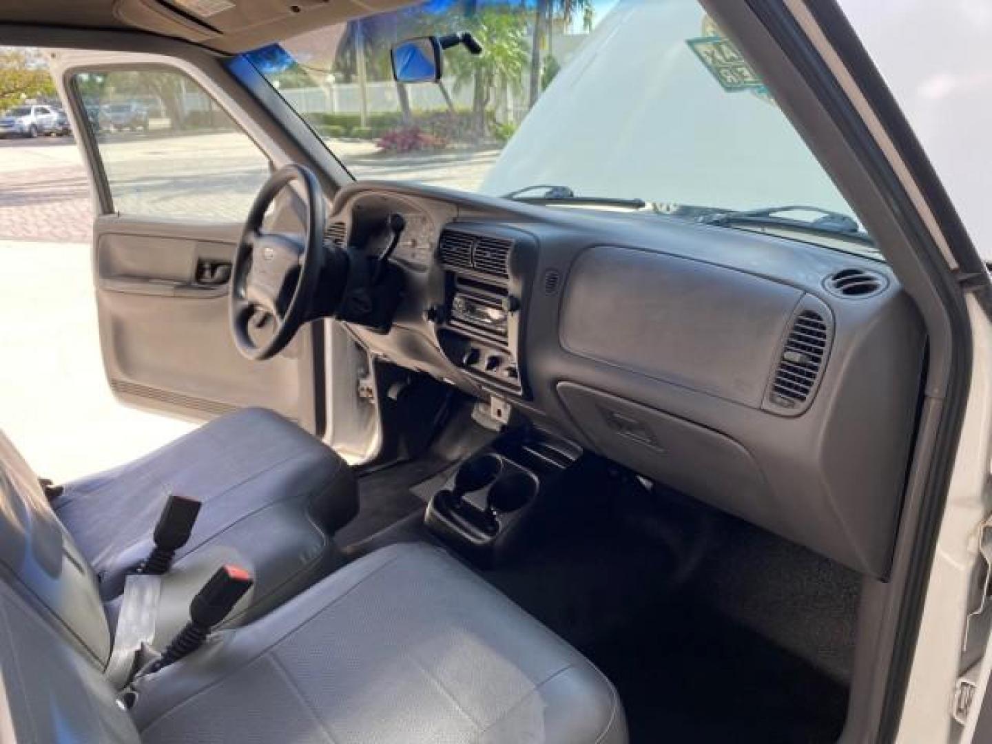 2002 Oxford White /Dark Graphite Ford Ranger Edge 1 OWNER LOW MILES 68,551 (1FTYR10U72P) with an 3.0L SEFI V6 Engine engine, Automatic transmission, located at 4701 North Dixie Hwy, Pompano Beach, FL, 33064, (954) 422-2889, 26.240938, -80.123474 - OUR WEBPAGE FLORIDACARS1.COM HAS OVER 100 PHOTOS AND FREE CARFAX LINK 2002 Ford Ranger Edge 1 OWNER Pickup 3.0L V6 F OHV Gasoline 22 MPG Rear Wheel Drive Features ABS Brakes Air Conditioning AM/FM Stereo Automatic Transmission Bed Liner CD Audio Vinyl Seats 2002 Ford Ranger Edge Regular Cab 2WD is a- Photo#11