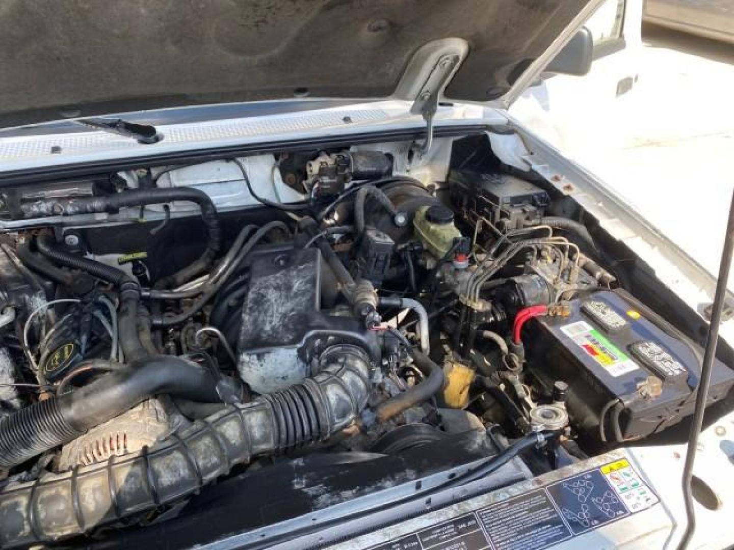 2002 Oxford White /Dark Graphite Ford Ranger Edge 1 OWNER LOW MILES 68,551 (1FTYR10U72P) with an 3.0L SEFI V6 Engine engine, Automatic transmission, located at 4701 North Dixie Hwy, Pompano Beach, FL, 33064, (954) 422-2889, 26.240938, -80.123474 - OUR WEBPAGE FLORIDACARS1.COM HAS OVER 100 PHOTOS AND FREE CARFAX LINK 2002 Ford Ranger Edge 1 OWNER Pickup 3.0L V6 F OHV Gasoline 22 MPG Rear Wheel Drive Features ABS Brakes Air Conditioning AM/FM Stereo Automatic Transmission Bed Liner CD Audio Vinyl Seats 2002 Ford Ranger Edge Regular Cab 2WD is a- Photo#24