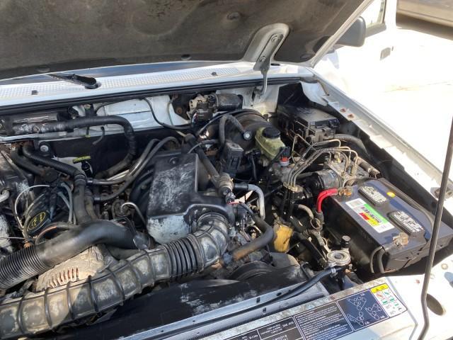 2002 Oxford White /Dark Graphite Ford Ranger Edge 1 OWNER LOW MILES 68,551 (1FTYR10U72P) with an 3.0L SEFI V6 Engine engine, Automatic transmission, located at 4701 North Dixie Hwy, Pompano Beach, FL, 33064, (954) 422-2889, 26.240938, -80.123474 - OUR WEBPAGE FLORIDACARS1.COM HAS OVER 100 PHOTOS AND FREE CARFAX LINK 2002 Ford Ranger Edge 1 OWNER Pickup 3.0L V6 F OHV Gasoline 22 MPG Rear Wheel Drive Features ABS Brakes Air Conditioning AM/FM Stereo Automatic Transmission Bed Liner CD Audio Vinyl Seats 2002 Ford Ranger Edge Regular Cab 2WD is a - Photo#25