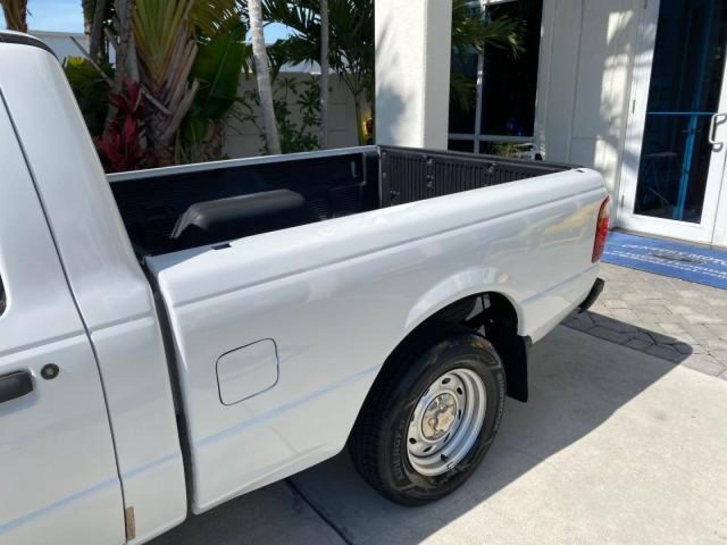 2002 Oxford White /Dark Graphite Ford Ranger Edge 1 OWNER LOW MILES 68,551 (1FTYR10U72P) with an 3.0L SEFI V6 Engine engine, Automatic transmission, located at 4701 North Dixie Hwy, Pompano Beach, FL, 33064, (954) 422-2889, 26.240938, -80.123474 - OUR WEBPAGE FLORIDACARS1.COM HAS OVER 100 PHOTOS AND FREE CARFAX LINK 2002 Ford Ranger Edge 1 OWNER Pickup 3.0L V6 F OHV Gasoline 22 MPG Rear Wheel Drive Features ABS Brakes Air Conditioning AM/FM Stereo Automatic Transmission Bed Liner CD Audio Vinyl Seats 2002 Ford Ranger Edge Regular Cab 2WD is a- Photo#70