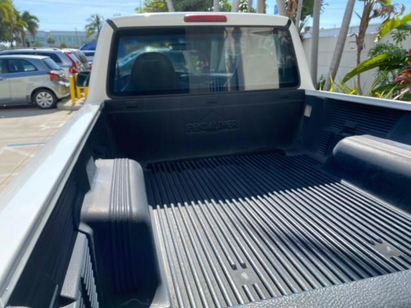 2002 Oxford White /Dark Graphite Ford Ranger Edge 1 OWNER LOW MILES 68,551 (1FTYR10U72P) with an 3.0L SEFI V6 Engine engine, Automatic transmission, located at 4701 North Dixie Hwy, Pompano Beach, FL, 33064, (954) 422-2889, 26.240938, -80.123474 - OUR WEBPAGE FLORIDACARS1.COM HAS OVER 100 PHOTOS AND FREE CARFAX LINK 2002 Ford Ranger Edge 1 OWNER Pickup 3.0L V6 F OHV Gasoline 22 MPG Rear Wheel Drive Features ABS Brakes Air Conditioning AM/FM Stereo Automatic Transmission Bed Liner CD Audio Vinyl Seats 2002 Ford Ranger Edge Regular Cab 2WD is a- Photo#82