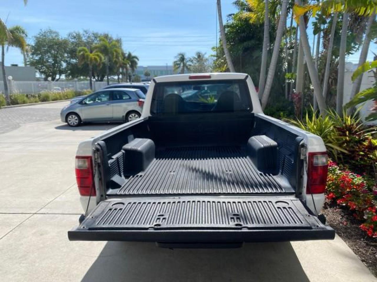 2002 Oxford White /Dark Graphite Ford Ranger Edge 1 OWNER LOW MILES 68,551 (1FTYR10U72P) with an 3.0L SEFI V6 Engine engine, Automatic transmission, located at 4701 North Dixie Hwy, Pompano Beach, FL, 33064, (954) 422-2889, 26.240938, -80.123474 - OUR WEBPAGE FLORIDACARS1.COM HAS OVER 100 PHOTOS AND FREE CARFAX LINK 2002 Ford Ranger Edge 1 OWNER Pickup 3.0L V6 F OHV Gasoline 22 MPG Rear Wheel Drive Features ABS Brakes Air Conditioning AM/FM Stereo Automatic Transmission Bed Liner CD Audio Vinyl Seats 2002 Ford Ranger Edge Regular Cab 2WD is a- Photo#88