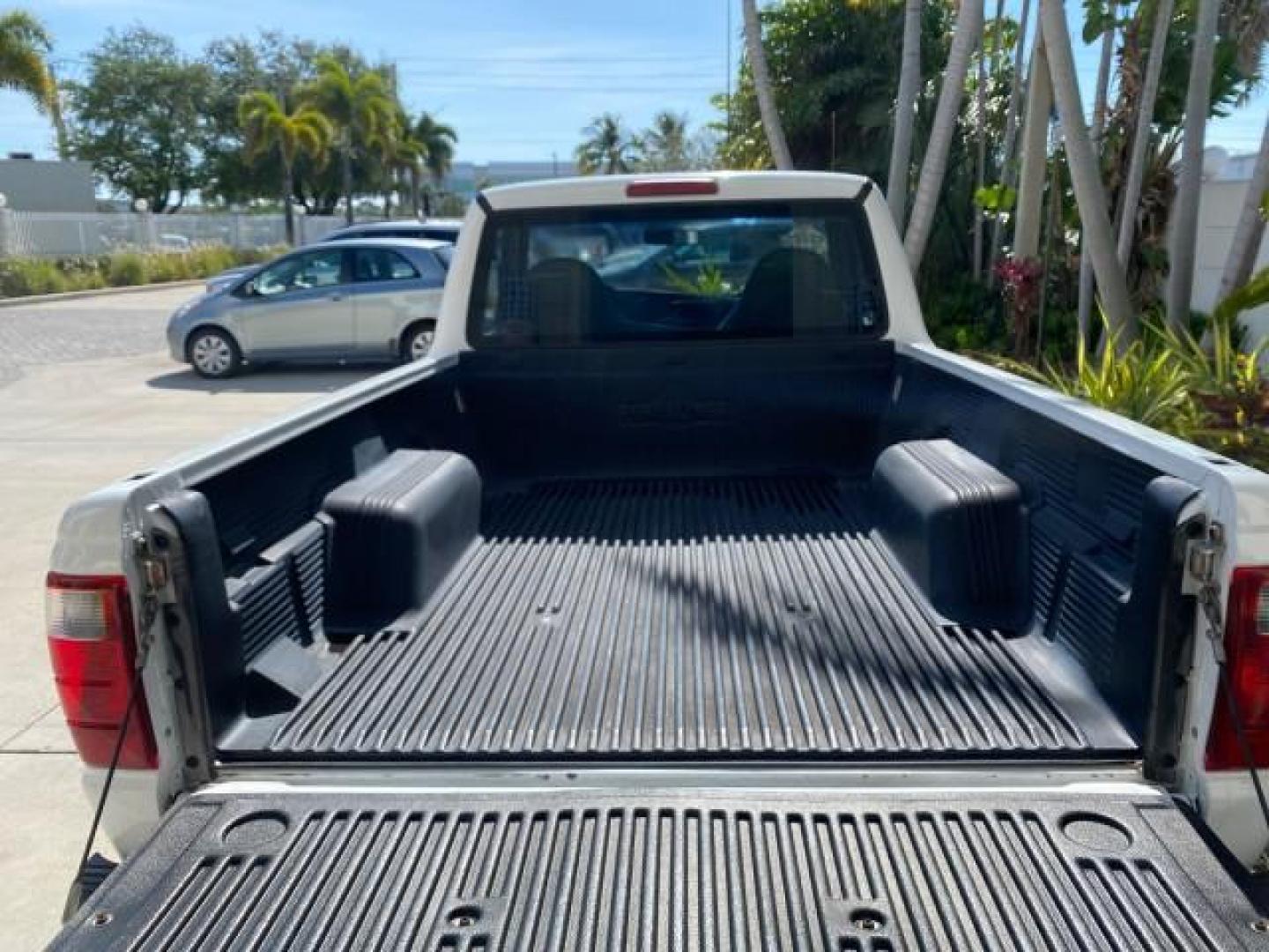 2002 Oxford White /Dark Graphite Ford Ranger Edge 1 OWNER LOW MILES 68,551 (1FTYR10U72P) with an 3.0L SEFI V6 Engine engine, Automatic transmission, located at 4701 North Dixie Hwy, Pompano Beach, FL, 33064, (954) 422-2889, 26.240938, -80.123474 - OUR WEBPAGE FLORIDACARS1.COM HAS OVER 100 PHOTOS AND FREE CARFAX LINK 2002 Ford Ranger Edge 1 OWNER Pickup 3.0L V6 F OHV Gasoline 22 MPG Rear Wheel Drive Features ABS Brakes Air Conditioning AM/FM Stereo Automatic Transmission Bed Liner CD Audio Vinyl Seats 2002 Ford Ranger Edge Regular Cab 2WD is a- Photo#89