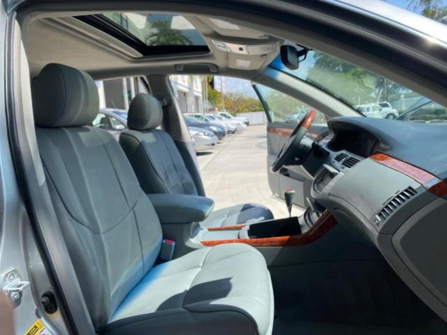 2007 Titanium Metallic /Graphite Toyota Avalon SUNROOF Limited LOW MILES 48,568 (4T1BK36B57U) with an 3.5L DOHC EFI 24-Valve V6 Engine engine, Automatic transmission, located at 4701 North Dixie Hwy, Pompano Beach, FL, 33064, (954) 422-2889, 26.240938, -80.123474 - OUR WEBPAGE FLORIDACARS1.COM HAS OVER 100 PHOTOS AND FREE CARFAX LINK 2007 Toyota Avalon LIMITED Sedan 4 DR 3.5L V6 F DOHC 24V Gasoline 28 MPG Front Wheel Drive Features A/C Seat(s) ABS Brakes Air Conditioning Alloy Wheels AM/FM Stereo Automatic Transmission Auxiliary Audio Input Cassette Player CD- Photo#12