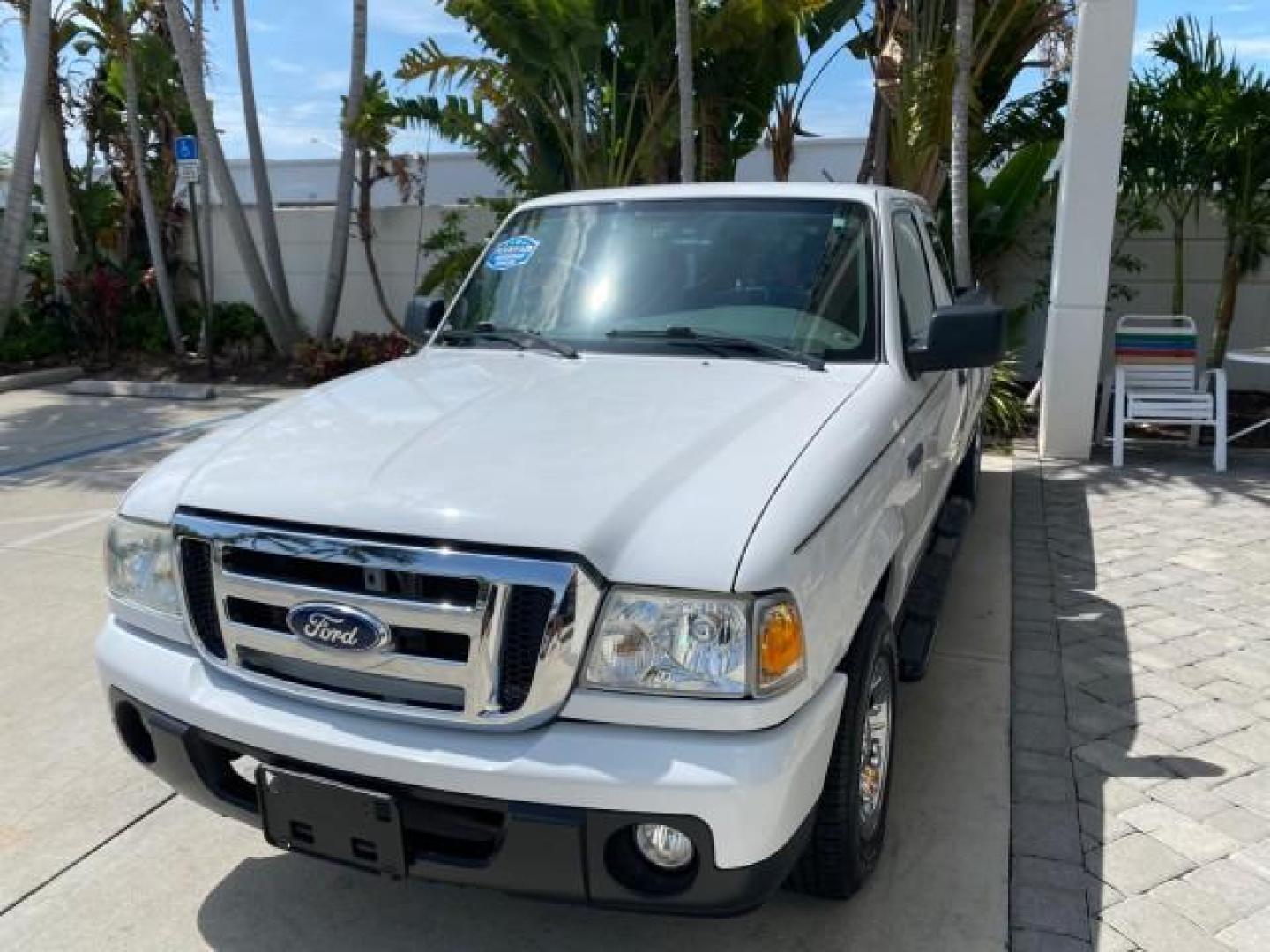 2011 Oxford White /Medium Dark Flint Ford Ranger X CAB XLT LOW MILES 44,686 (1FTKR4EE4BP) with an 4.0L SOHC V6 Engine engine, Automatic transmission, located at 4701 North Dixie Hwy, Pompano Beach, FL, 33064, (954) 422-2889, 26.240938, -80.123474 - OUR WEBPAGE FLORIDACARS1.COM HAS OVER 100 PHOTOS AND FREE CARFAX LINK 2011 Ford Ranger XLT 4 Door Extended Cab Pickup 4.0L V6 F SOHC 16V Gasoline 21 MPG Rear Wheel Drive Features ABS Brakes Air Conditioning AM/FM Stereo Automatic Transmission Auxiliary Audio Input Bed Liner CD Audio Cloth Seats Crui- Photo#3