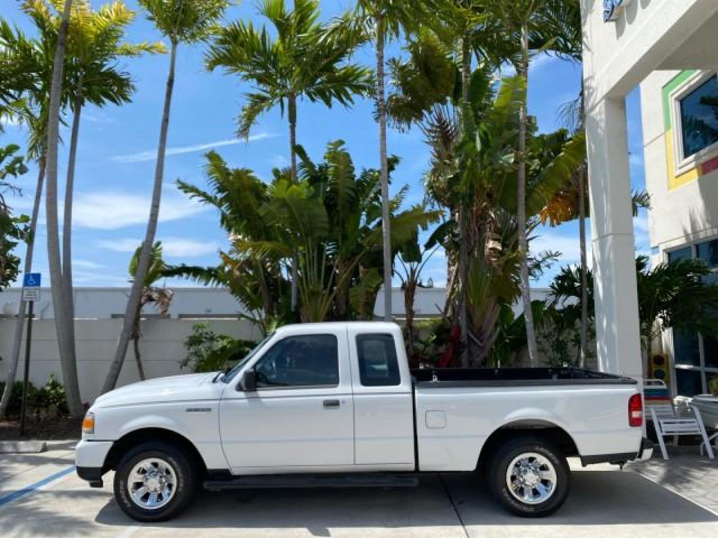 2011 Oxford White /Medium Dark Flint Ford Ranger X CAB XLT LOW MILES 44,686 (1FTKR4EE4BP) with an 4.0L SOHC V6 Engine engine, Automatic transmission, located at 4701 North Dixie Hwy, Pompano Beach, FL, 33064, (954) 422-2889, 26.240938, -80.123474 - OUR WEBPAGE FLORIDACARS1.COM HAS OVER 100 PHOTOS AND FREE CARFAX LINK 2011 Ford Ranger XLT 4 Door Extended Cab Pickup 4.0L V6 F SOHC 16V Gasoline 21 MPG Rear Wheel Drive Features ABS Brakes Air Conditioning AM/FM Stereo Automatic Transmission Auxiliary Audio Input Bed Liner CD Audio Cloth Seats Crui- Photo#4
