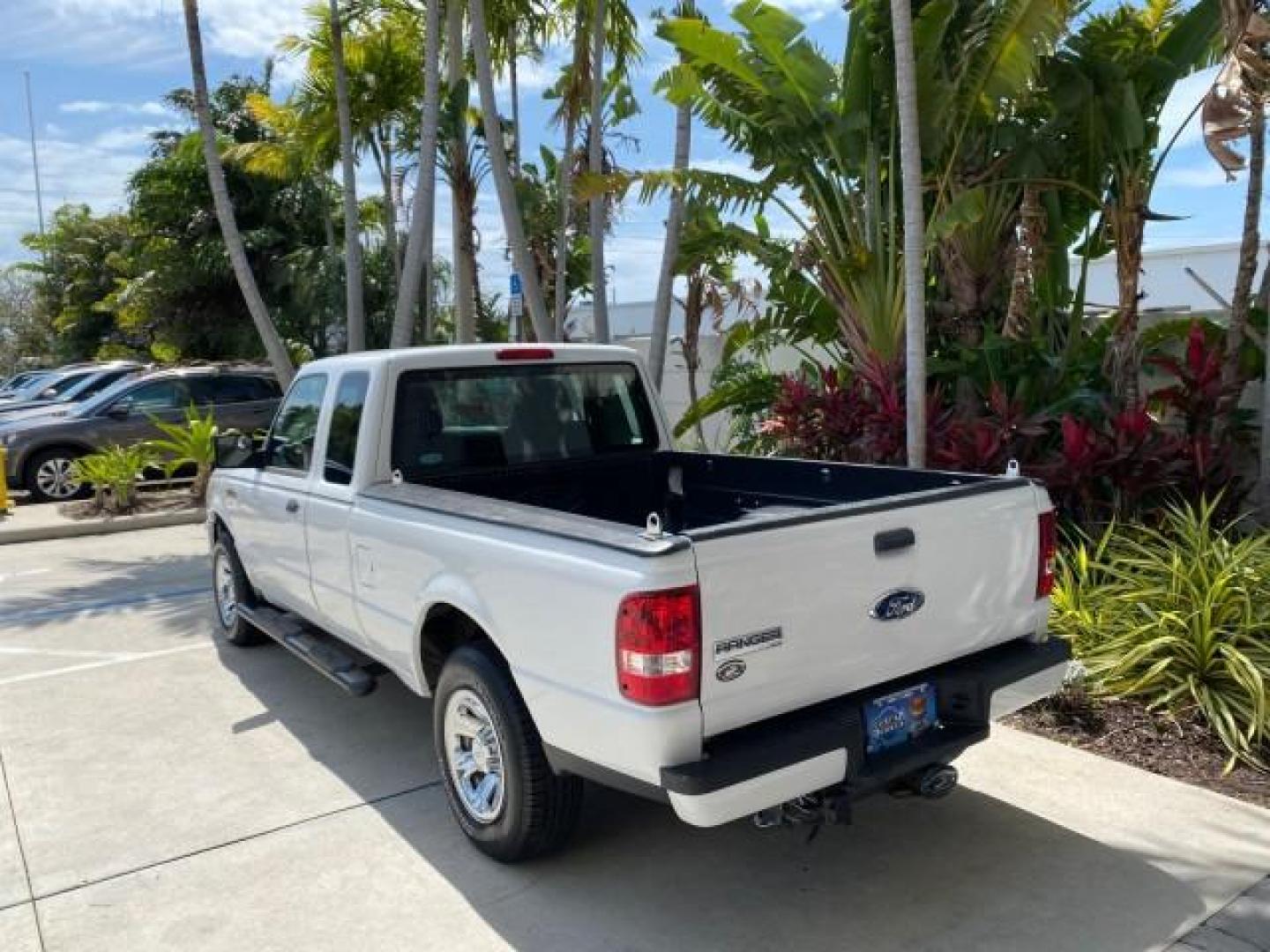 2011 Oxford White /Medium Dark Flint Ford Ranger X CAB XLT LOW MILES 44,686 (1FTKR4EE4BP) with an 4.0L SOHC V6 Engine engine, Automatic transmission, located at 4701 North Dixie Hwy, Pompano Beach, FL, 33064, (954) 422-2889, 26.240938, -80.123474 - OUR WEBPAGE FLORIDACARS1.COM HAS OVER 100 PHOTOS AND FREE CARFAX LINK 2011 Ford Ranger XLT 4 Door Extended Cab Pickup 4.0L V6 F SOHC 16V Gasoline 21 MPG Rear Wheel Drive Features ABS Brakes Air Conditioning AM/FM Stereo Automatic Transmission Auxiliary Audio Input Bed Liner CD Audio Cloth Seats Crui- Photo#5