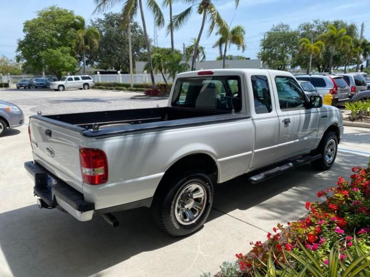 2011 Oxford White /Medium Dark Flint Ford Ranger X CAB XLT LOW MILES 44,686 (1FTKR4EE4BP) with an 4.0L SOHC V6 Engine engine, Automatic transmission, located at 4701 North Dixie Hwy, Pompano Beach, FL, 33064, (954) 422-2889, 26.240938, -80.123474 - OUR WEBPAGE FLORIDACARS1.COM HAS OVER 100 PHOTOS AND FREE CARFAX LINK 2011 Ford Ranger XLT 4 Door Extended Cab Pickup 4.0L V6 F SOHC 16V Gasoline 21 MPG Rear Wheel Drive Features ABS Brakes Air Conditioning AM/FM Stereo Automatic Transmission Auxiliary Audio Input Bed Liner CD Audio Cloth Seats Crui- Photo#7