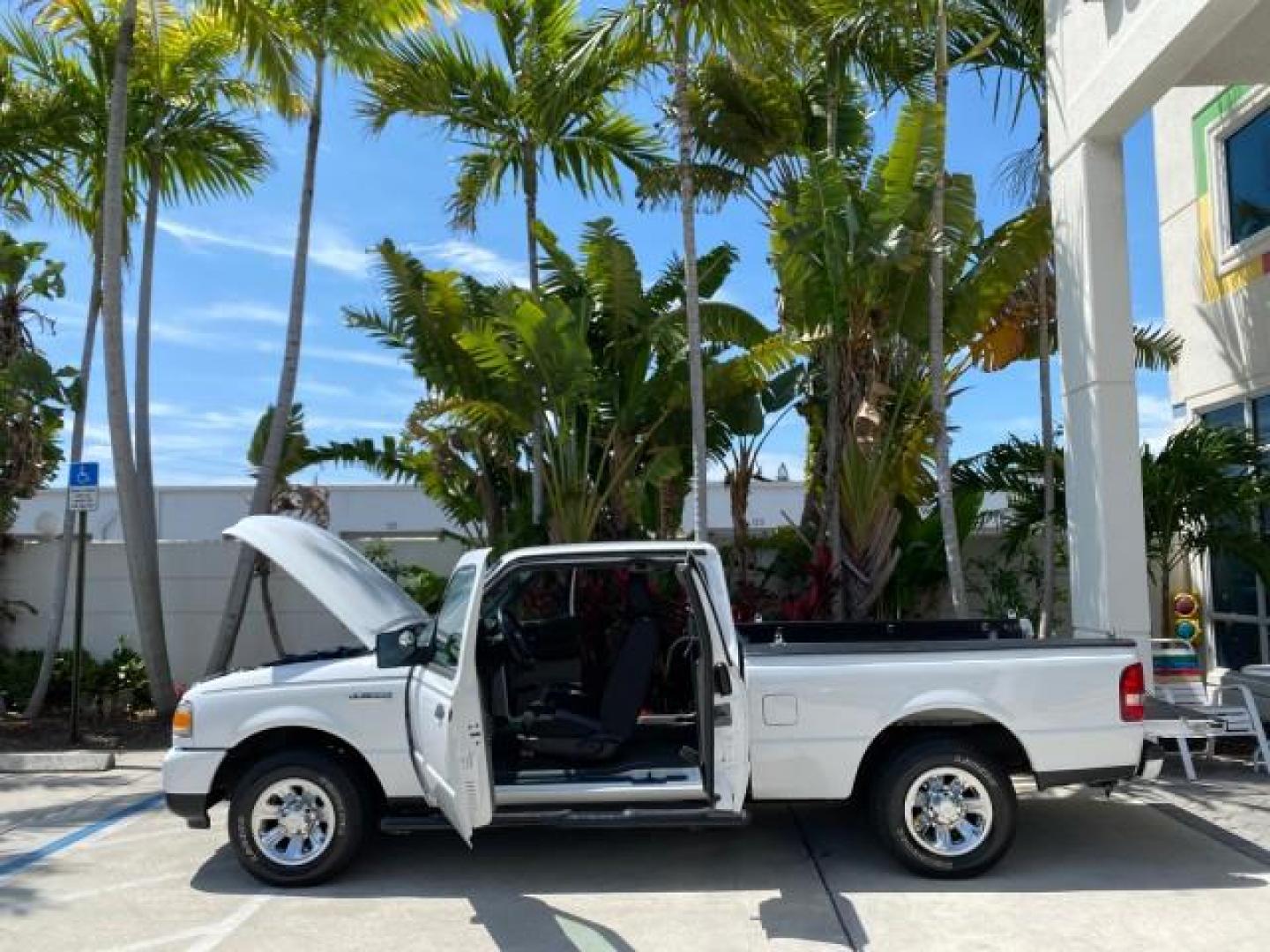 2011 Oxford White /Medium Dark Flint Ford Ranger X CAB XLT LOW MILES 44,686 (1FTKR4EE4BP) with an 4.0L SOHC V6 Engine engine, Automatic transmission, located at 4701 North Dixie Hwy, Pompano Beach, FL, 33064, (954) 422-2889, 26.240938, -80.123474 - OUR WEBPAGE FLORIDACARS1.COM HAS OVER 100 PHOTOS AND FREE CARFAX LINK 2011 Ford Ranger XLT 4 Door Extended Cab Pickup 4.0L V6 F SOHC 16V Gasoline 21 MPG Rear Wheel Drive Features ABS Brakes Air Conditioning AM/FM Stereo Automatic Transmission Auxiliary Audio Input Bed Liner CD Audio Cloth Seats Crui- Photo#8