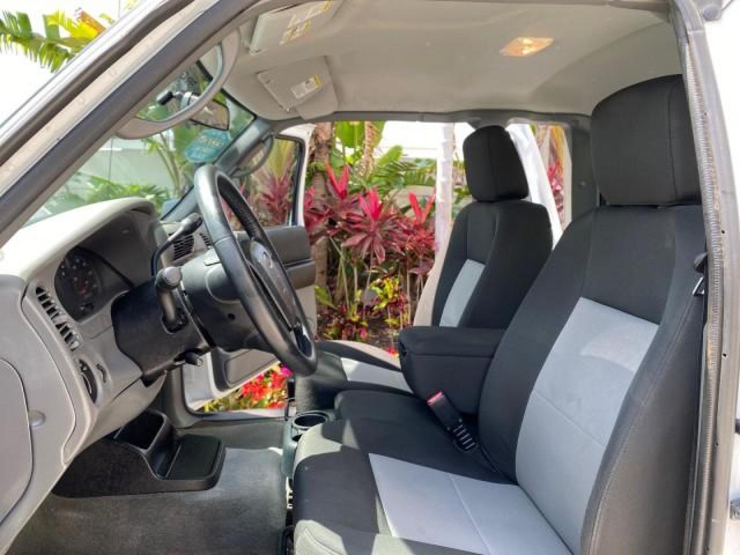 2011 Oxford White /Medium Dark Flint Ford Ranger X CAB XLT LOW MILES 44,686 (1FTKR4EE4BP) with an 4.0L SOHC V6 Engine engine, Automatic transmission, located at 4701 North Dixie Hwy, Pompano Beach, FL, 33064, (954) 422-2889, 26.240938, -80.123474 - OUR WEBPAGE FLORIDACARS1.COM HAS OVER 100 PHOTOS AND FREE CARFAX LINK 2011 Ford Ranger XLT 4 Door Extended Cab Pickup 4.0L V6 F SOHC 16V Gasoline 21 MPG Rear Wheel Drive Features ABS Brakes Air Conditioning AM/FM Stereo Automatic Transmission Auxiliary Audio Input Bed Liner CD Audio Cloth Seats Crui- Photo#10
