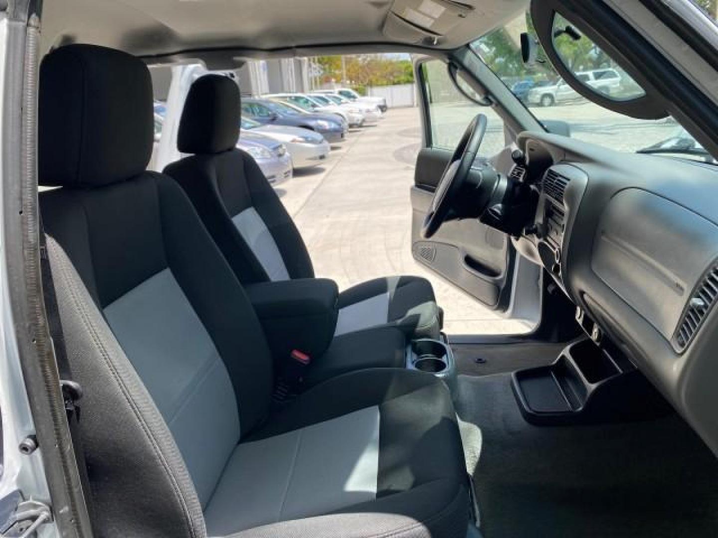 2011 Oxford White /Medium Dark Flint Ford Ranger X CAB XLT LOW MILES 44,686 (1FTKR4EE4BP) with an 4.0L SOHC V6 Engine engine, Automatic transmission, located at 4701 North Dixie Hwy, Pompano Beach, FL, 33064, (954) 422-2889, 26.240938, -80.123474 - OUR WEBPAGE FLORIDACARS1.COM HAS OVER 100 PHOTOS AND FREE CARFAX LINK 2011 Ford Ranger XLT 4 Door Extended Cab Pickup 4.0L V6 F SOHC 16V Gasoline 21 MPG Rear Wheel Drive Features ABS Brakes Air Conditioning AM/FM Stereo Automatic Transmission Auxiliary Audio Input Bed Liner CD Audio Cloth Seats Crui- Photo#12
