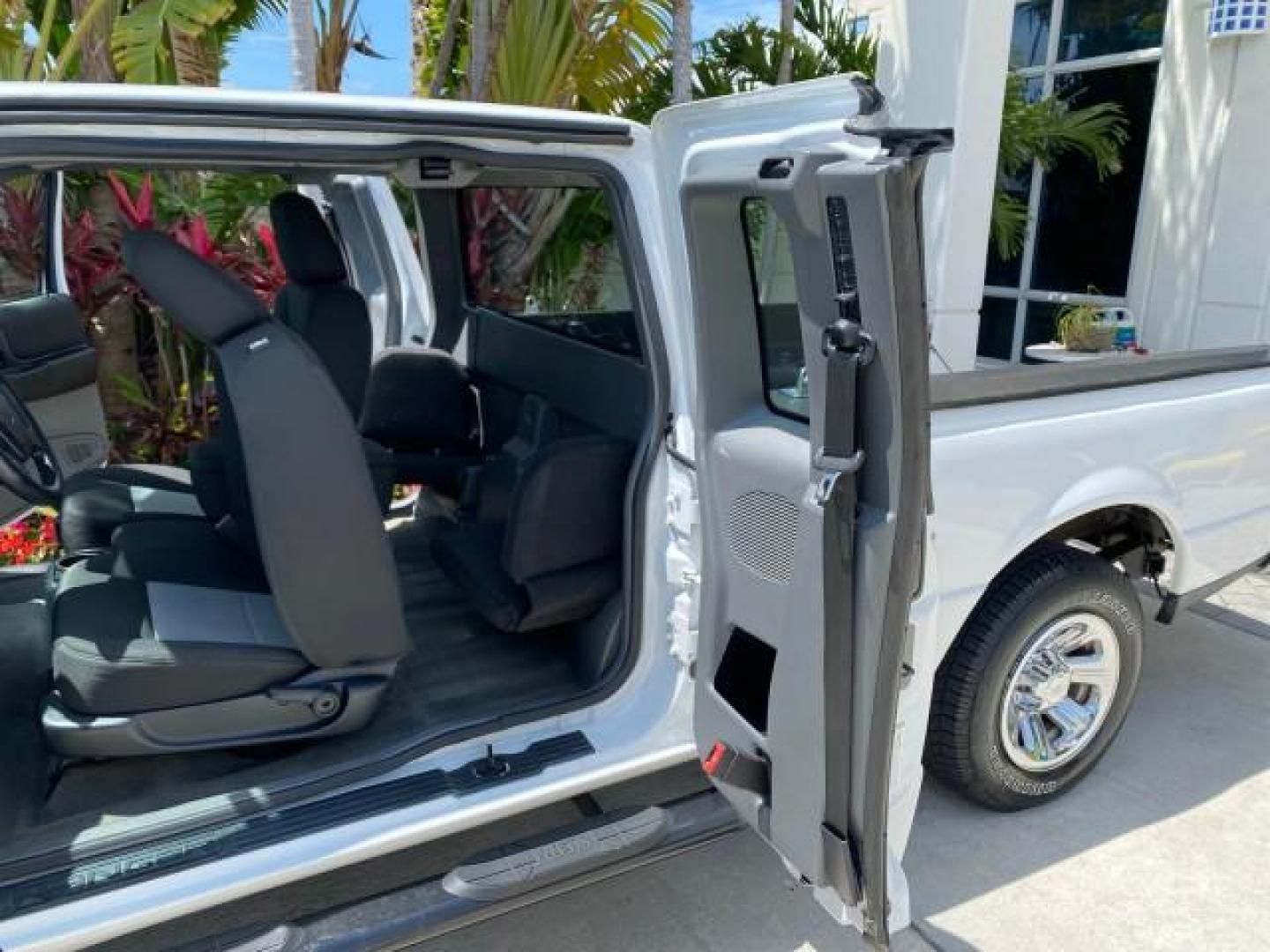 2011 Oxford White /Medium Dark Flint Ford Ranger X CAB XLT LOW MILES 44,686 (1FTKR4EE4BP) with an 4.0L SOHC V6 Engine engine, Automatic transmission, located at 4701 North Dixie Hwy, Pompano Beach, FL, 33064, (954) 422-2889, 26.240938, -80.123474 - OUR WEBPAGE FLORIDACARS1.COM HAS OVER 100 PHOTOS AND FREE CARFAX LINK 2011 Ford Ranger XLT 4 Door Extended Cab Pickup 4.0L V6 F SOHC 16V Gasoline 21 MPG Rear Wheel Drive Features ABS Brakes Air Conditioning AM/FM Stereo Automatic Transmission Auxiliary Audio Input Bed Liner CD Audio Cloth Seats Crui- Photo#13