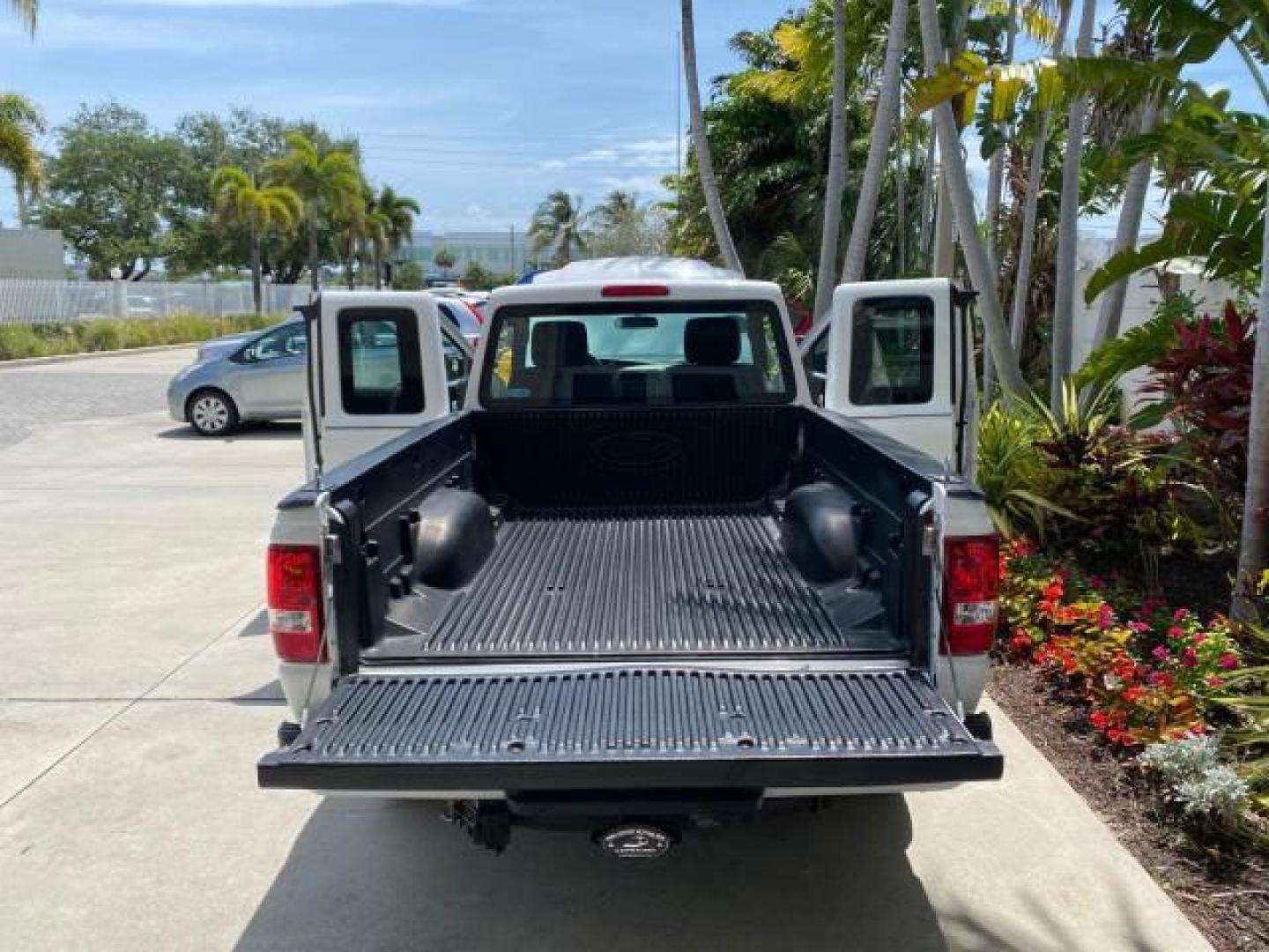 2011 Oxford White /Medium Dark Flint Ford Ranger X CAB XLT LOW MILES 44,686 (1FTKR4EE4BP) with an 4.0L SOHC V6 Engine engine, Automatic transmission, located at 4701 North Dixie Hwy, Pompano Beach, FL, 33064, (954) 422-2889, 26.240938, -80.123474 - OUR WEBPAGE FLORIDACARS1.COM HAS OVER 100 PHOTOS AND FREE CARFAX LINK 2011 Ford Ranger XLT 4 Door Extended Cab Pickup 4.0L V6 F SOHC 16V Gasoline 21 MPG Rear Wheel Drive Features ABS Brakes Air Conditioning AM/FM Stereo Automatic Transmission Auxiliary Audio Input Bed Liner CD Audio Cloth Seats Crui- Photo#15