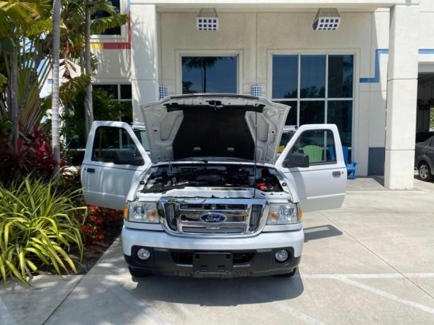 2011 Oxford White /Medium Dark Flint Ford Ranger X CAB XLT LOW MILES 44,686 (1FTKR4EE4BP) with an 4.0L SOHC V6 Engine engine, Automatic transmission, located at 4701 North Dixie Hwy, Pompano Beach, FL, 33064, (954) 422-2889, 26.240938, -80.123474 - OUR WEBPAGE FLORIDACARS1.COM HAS OVER 100 PHOTOS AND FREE CARFAX LINK 2011 Ford Ranger XLT 4 Door Extended Cab Pickup 4.0L V6 F SOHC 16V Gasoline 21 MPG Rear Wheel Drive Features ABS Brakes Air Conditioning AM/FM Stereo Automatic Transmission Auxiliary Audio Input Bed Liner CD Audio Cloth Seats Crui- Photo#16