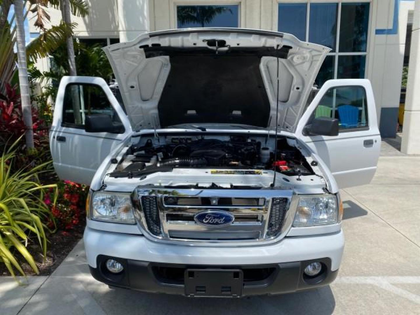 2011 Oxford White /Medium Dark Flint Ford Ranger X CAB XLT LOW MILES 44,686 (1FTKR4EE4BP) with an 4.0L SOHC V6 Engine engine, Automatic transmission, located at 4701 North Dixie Hwy, Pompano Beach, FL, 33064, (954) 422-2889, 26.240938, -80.123474 - OUR WEBPAGE FLORIDACARS1.COM HAS OVER 100 PHOTOS AND FREE CARFAX LINK 2011 Ford Ranger XLT 4 Door Extended Cab Pickup 4.0L V6 F SOHC 16V Gasoline 21 MPG Rear Wheel Drive Features ABS Brakes Air Conditioning AM/FM Stereo Automatic Transmission Auxiliary Audio Input Bed Liner CD Audio Cloth Seats Crui- Photo#17