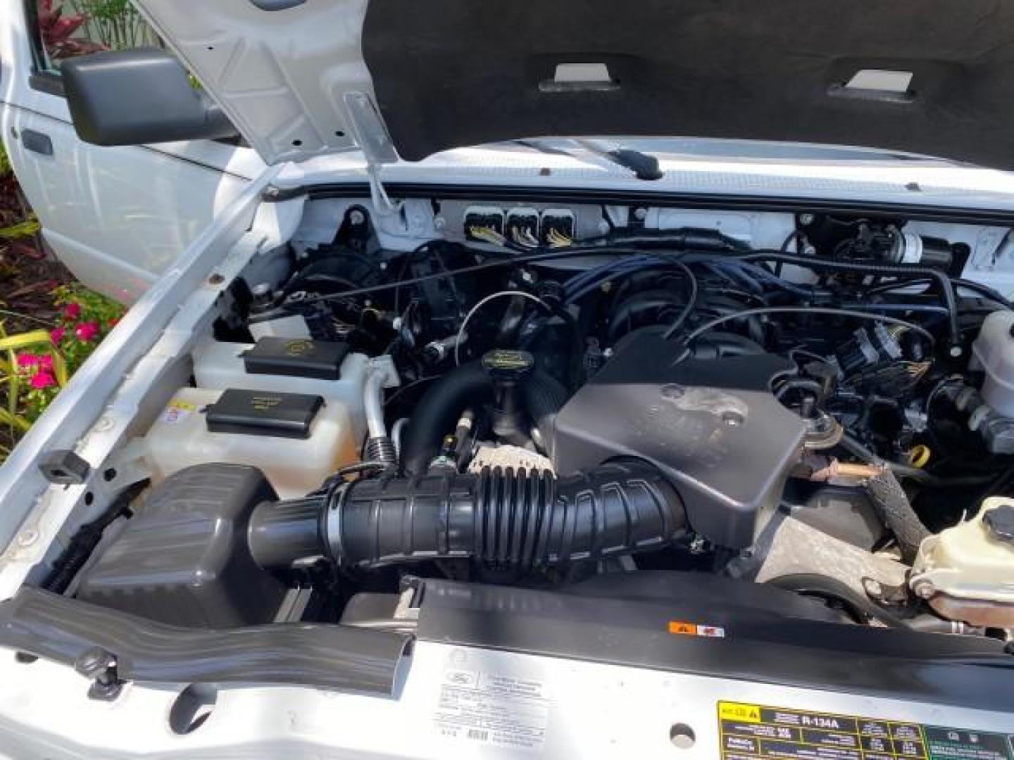 2011 Oxford White /Medium Dark Flint Ford Ranger X CAB XLT LOW MILES 44,686 (1FTKR4EE4BP) with an 4.0L SOHC V6 Engine engine, Automatic transmission, located at 4701 North Dixie Hwy, Pompano Beach, FL, 33064, (954) 422-2889, 26.240938, -80.123474 - OUR WEBPAGE FLORIDACARS1.COM HAS OVER 100 PHOTOS AND FREE CARFAX LINK 2011 Ford Ranger XLT 4 Door Extended Cab Pickup 4.0L V6 F SOHC 16V Gasoline 21 MPG Rear Wheel Drive Features ABS Brakes Air Conditioning AM/FM Stereo Automatic Transmission Auxiliary Audio Input Bed Liner CD Audio Cloth Seats Crui- Photo#24