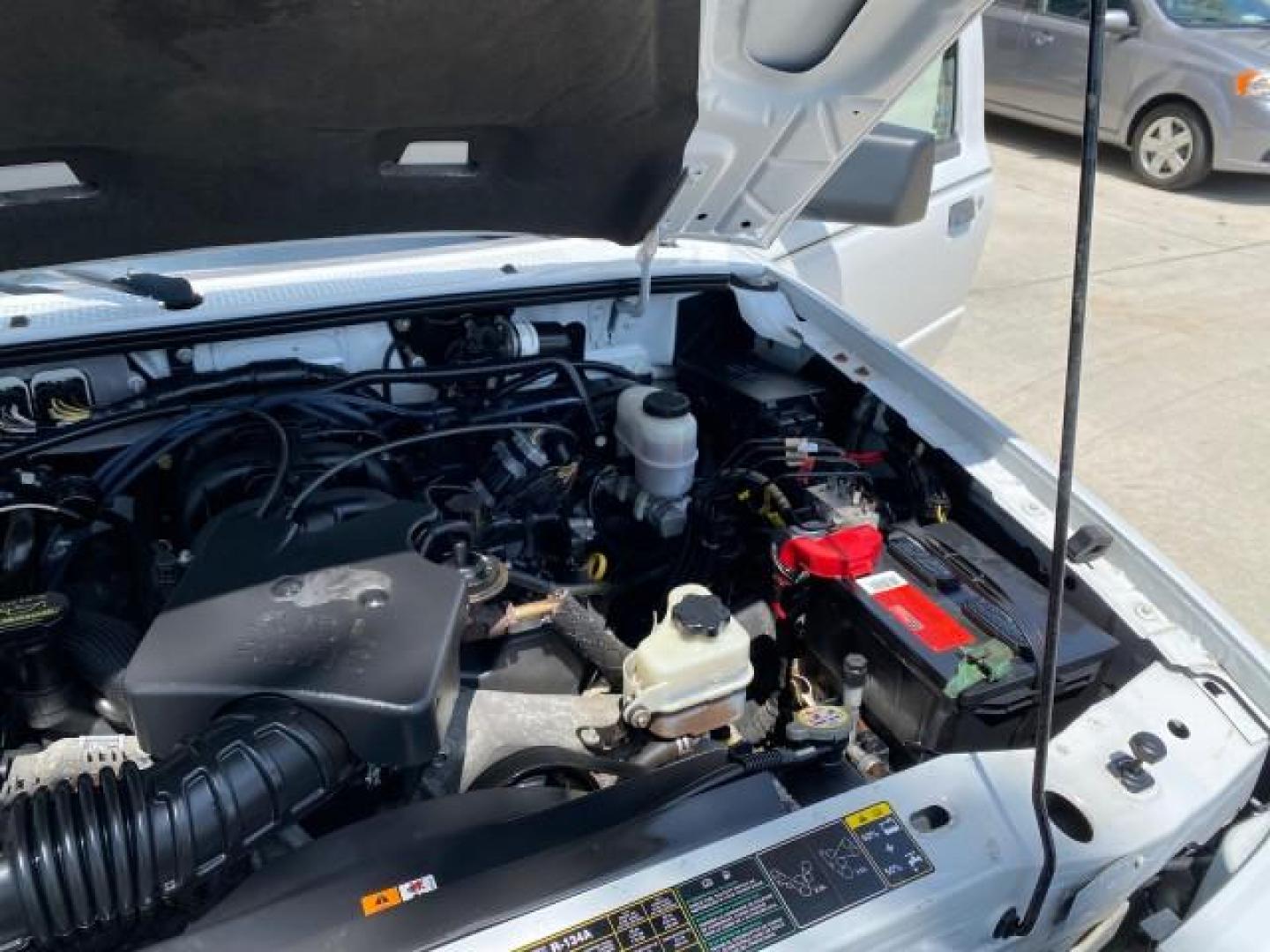 2011 Oxford White /Medium Dark Flint Ford Ranger X CAB XLT LOW MILES 44,686 (1FTKR4EE4BP) with an 4.0L SOHC V6 Engine engine, Automatic transmission, located at 4701 North Dixie Hwy, Pompano Beach, FL, 33064, (954) 422-2889, 26.240938, -80.123474 - OUR WEBPAGE FLORIDACARS1.COM HAS OVER 100 PHOTOS AND FREE CARFAX LINK 2011 Ford Ranger XLT 4 Door Extended Cab Pickup 4.0L V6 F SOHC 16V Gasoline 21 MPG Rear Wheel Drive Features ABS Brakes Air Conditioning AM/FM Stereo Automatic Transmission Auxiliary Audio Input Bed Liner CD Audio Cloth Seats Crui- Photo#25
