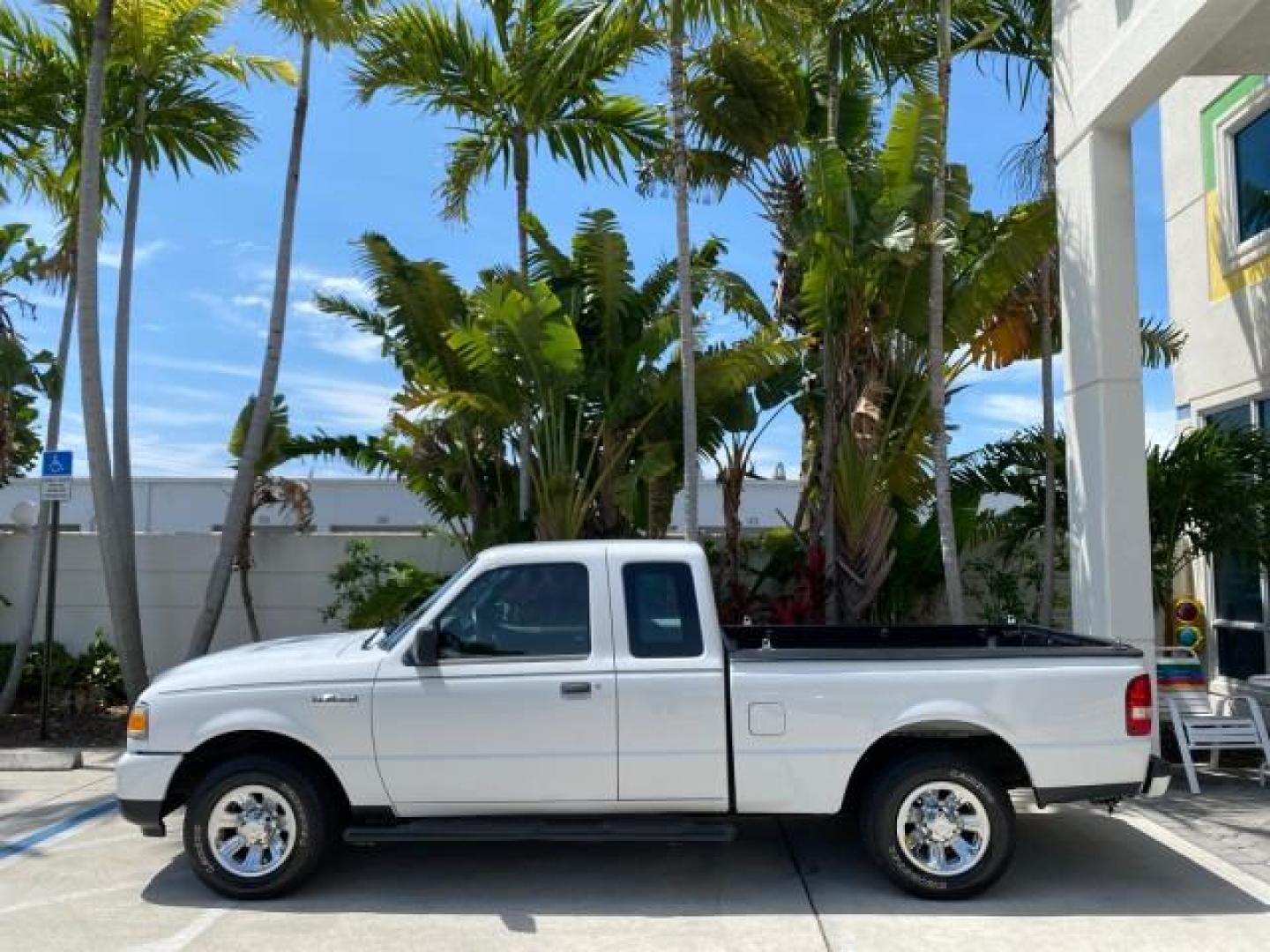 2011 Oxford White /Medium Dark Flint Ford Ranger X CAB XLT LOW MILES 44,686 (1FTKR4EE4BP) with an 4.0L SOHC V6 Engine engine, Automatic transmission, located at 4701 North Dixie Hwy, Pompano Beach, FL, 33064, (954) 422-2889, 26.240938, -80.123474 - OUR WEBPAGE FLORIDACARS1.COM HAS OVER 100 PHOTOS AND FREE CARFAX LINK 2011 Ford Ranger XLT 4 Door Extended Cab Pickup 4.0L V6 F SOHC 16V Gasoline 21 MPG Rear Wheel Drive Features ABS Brakes Air Conditioning AM/FM Stereo Automatic Transmission Auxiliary Audio Input Bed Liner CD Audio Cloth Seats Crui- Photo#30