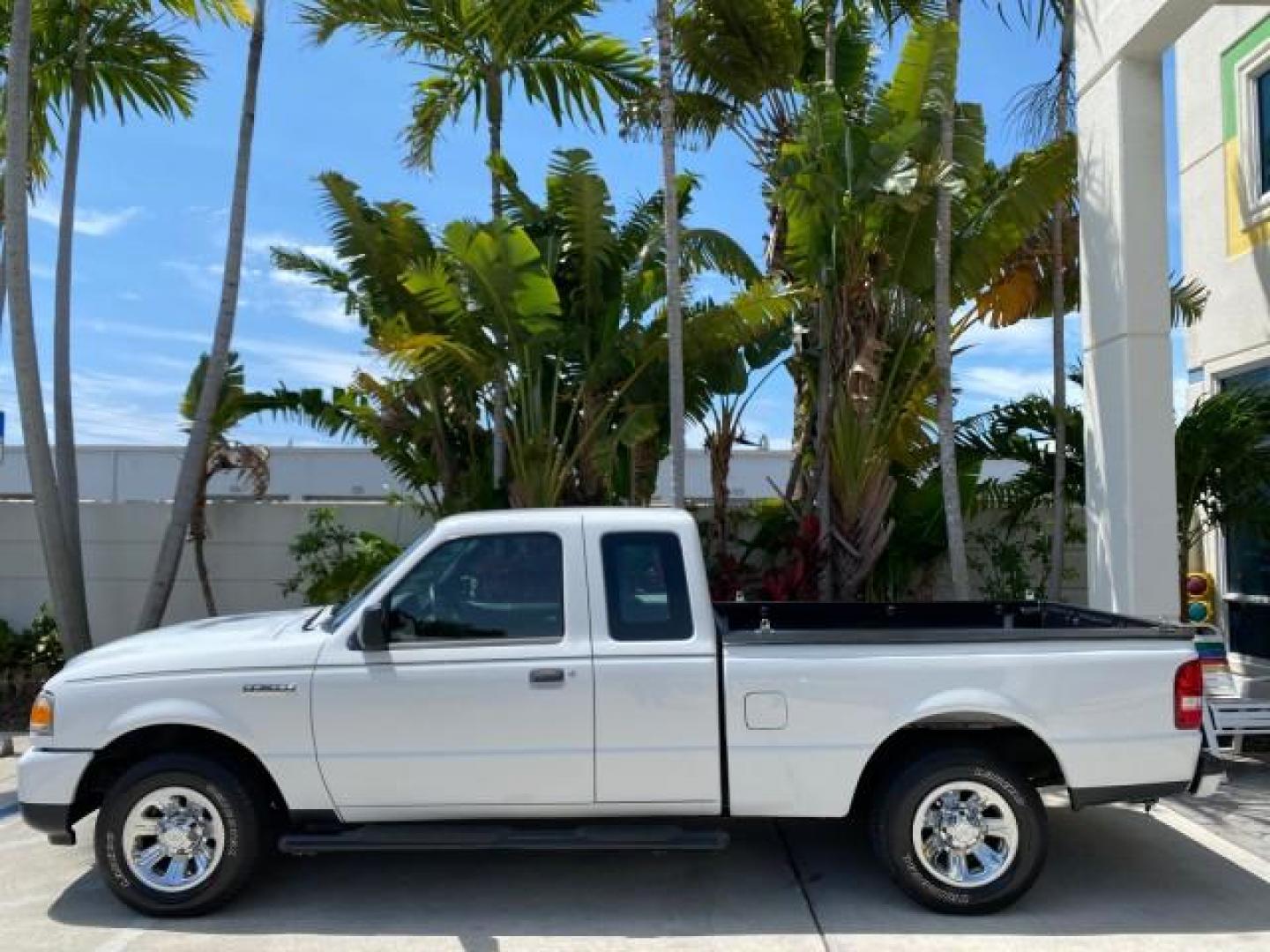 2011 Oxford White /Medium Dark Flint Ford Ranger X CAB XLT LOW MILES 44,686 (1FTKR4EE4BP) with an 4.0L SOHC V6 Engine engine, Automatic transmission, located at 4701 North Dixie Hwy, Pompano Beach, FL, 33064, (954) 422-2889, 26.240938, -80.123474 - OUR WEBPAGE FLORIDACARS1.COM HAS OVER 100 PHOTOS AND FREE CARFAX LINK 2011 Ford Ranger XLT 4 Door Extended Cab Pickup 4.0L V6 F SOHC 16V Gasoline 21 MPG Rear Wheel Drive Features ABS Brakes Air Conditioning AM/FM Stereo Automatic Transmission Auxiliary Audio Input Bed Liner CD Audio Cloth Seats Crui- Photo#31