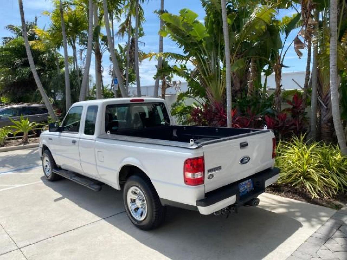 2011 Oxford White /Medium Dark Flint Ford Ranger X CAB XLT LOW MILES 44,686 (1FTKR4EE4BP) with an 4.0L SOHC V6 Engine engine, Automatic transmission, located at 4701 North Dixie Hwy, Pompano Beach, FL, 33064, (954) 422-2889, 26.240938, -80.123474 - OUR WEBPAGE FLORIDACARS1.COM HAS OVER 100 PHOTOS AND FREE CARFAX LINK 2011 Ford Ranger XLT 4 Door Extended Cab Pickup 4.0L V6 F SOHC 16V Gasoline 21 MPG Rear Wheel Drive Features ABS Brakes Air Conditioning AM/FM Stereo Automatic Transmission Auxiliary Audio Input Bed Liner CD Audio Cloth Seats Crui- Photo#32