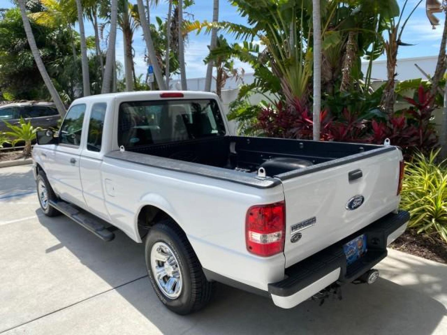 2011 Oxford White /Medium Dark Flint Ford Ranger X CAB XLT LOW MILES 44,686 (1FTKR4EE4BP) with an 4.0L SOHC V6 Engine engine, Automatic transmission, located at 4701 North Dixie Hwy, Pompano Beach, FL, 33064, (954) 422-2889, 26.240938, -80.123474 - OUR WEBPAGE FLORIDACARS1.COM HAS OVER 100 PHOTOS AND FREE CARFAX LINK 2011 Ford Ranger XLT 4 Door Extended Cab Pickup 4.0L V6 F SOHC 16V Gasoline 21 MPG Rear Wheel Drive Features ABS Brakes Air Conditioning AM/FM Stereo Automatic Transmission Auxiliary Audio Input Bed Liner CD Audio Cloth Seats Crui- Photo#33