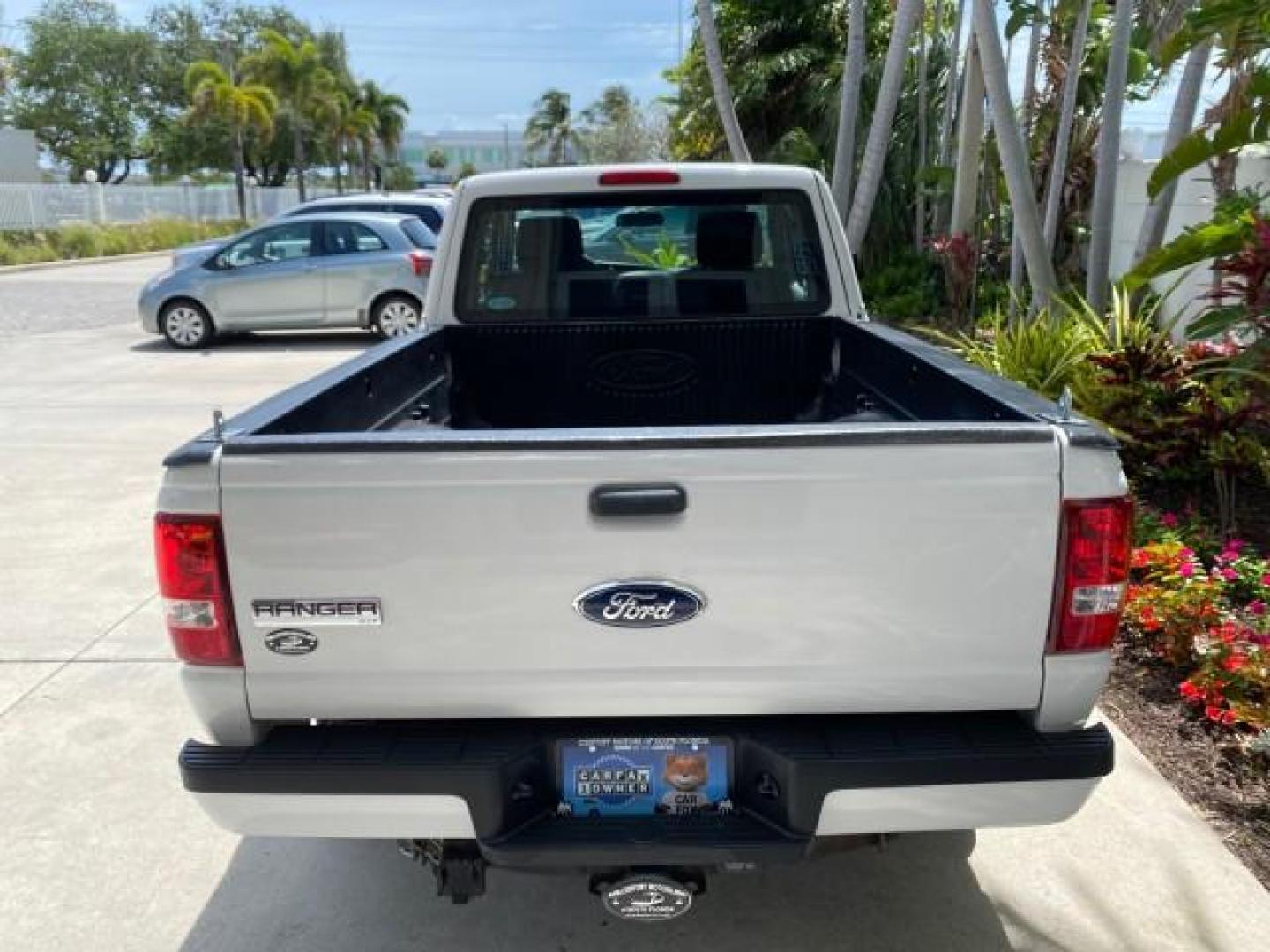 2011 Oxford White /Medium Dark Flint Ford Ranger X CAB XLT LOW MILES 44,686 (1FTKR4EE4BP) with an 4.0L SOHC V6 Engine engine, Automatic transmission, located at 4701 North Dixie Hwy, Pompano Beach, FL, 33064, (954) 422-2889, 26.240938, -80.123474 - OUR WEBPAGE FLORIDACARS1.COM HAS OVER 100 PHOTOS AND FREE CARFAX LINK 2011 Ford Ranger XLT 4 Door Extended Cab Pickup 4.0L V6 F SOHC 16V Gasoline 21 MPG Rear Wheel Drive Features ABS Brakes Air Conditioning AM/FM Stereo Automatic Transmission Auxiliary Audio Input Bed Liner CD Audio Cloth Seats Crui- Photo#35