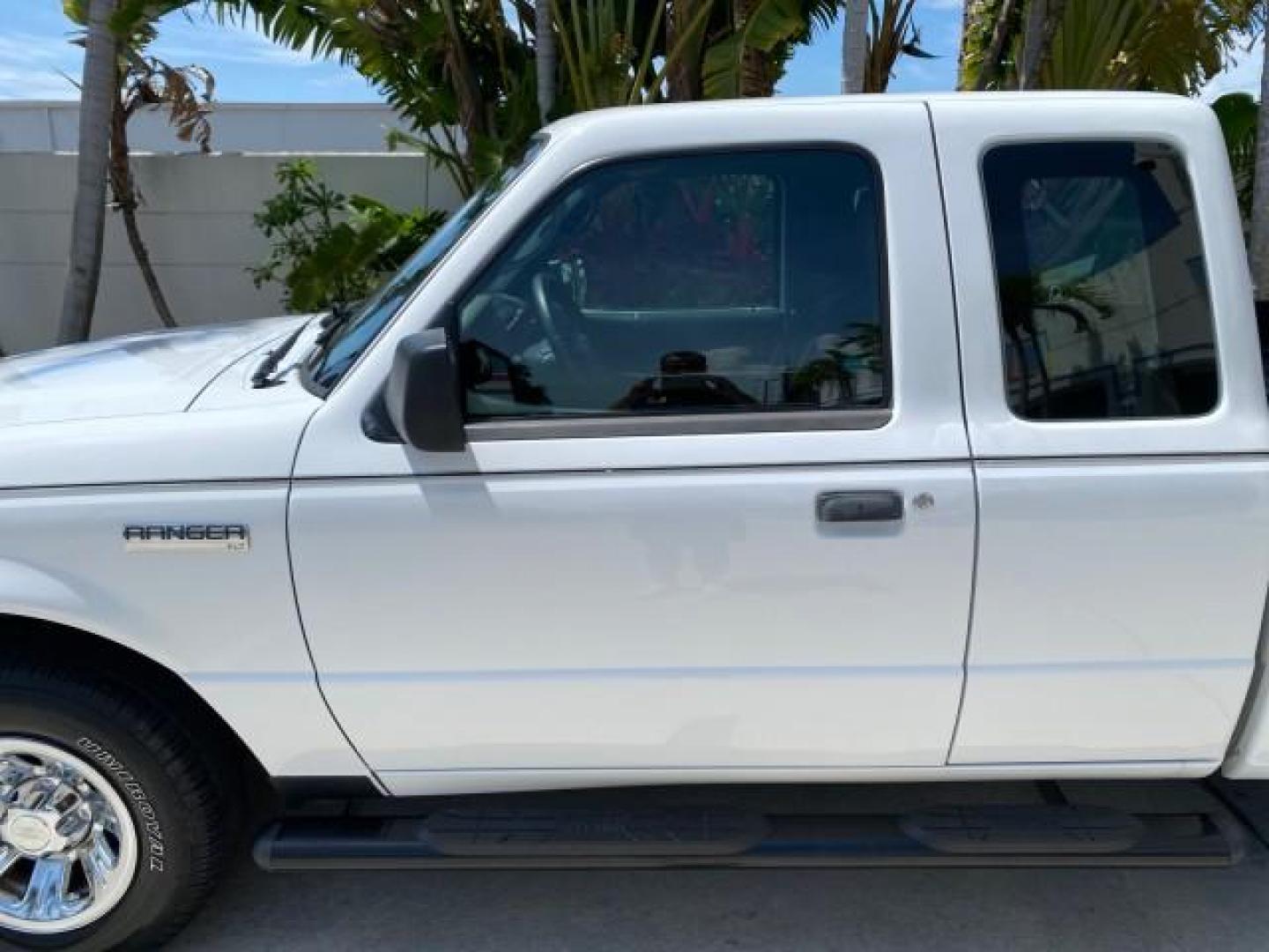 2011 Oxford White /Medium Dark Flint Ford Ranger X CAB XLT LOW MILES 44,686 (1FTKR4EE4BP) with an 4.0L SOHC V6 Engine engine, Automatic transmission, located at 4701 North Dixie Hwy, Pompano Beach, FL, 33064, (954) 422-2889, 26.240938, -80.123474 - OUR WEBPAGE FLORIDACARS1.COM HAS OVER 100 PHOTOS AND FREE CARFAX LINK 2011 Ford Ranger XLT 4 Door Extended Cab Pickup 4.0L V6 F SOHC 16V Gasoline 21 MPG Rear Wheel Drive Features ABS Brakes Air Conditioning AM/FM Stereo Automatic Transmission Auxiliary Audio Input Bed Liner CD Audio Cloth Seats Crui- Photo#39