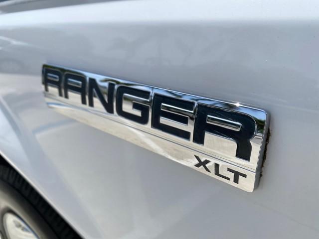 2011 Oxford White /Medium Dark Flint Ford Ranger XLT LOW MILES 44,686 (1FTKR4EE4BP) with an 4.0L SOHC V6 Engine engine, Automatic transmission, located at 4701 North Dixie Hwy, Pompano Beach, FL, 33064, (954) 422-2889, 26.240938, -80.123474 - OUR WEBPAGE FLORIDACARS1.COM HAS OVER 100 PHOTOS AND FREE CARFAX LINK 2011 Ford Ranger XLT 4 Door Extended Cab Pickup 4.0L V6 F SOHC 16V Gasoline 21 MPG Rear Wheel Drive Features ABS Brakes Air Conditioning AM/FM Stereo Automatic Transmission Auxiliary Audio Input Bed Liner CD Audio Cloth Seats Crui - Photo#43