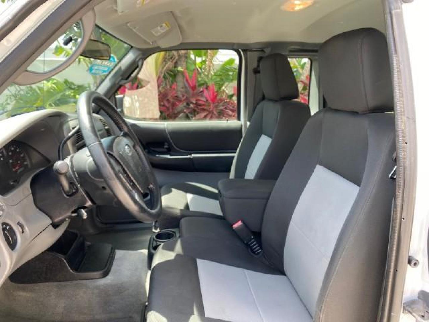 2011 Oxford White /Medium Dark Flint Ford Ranger X CAB XLT LOW MILES 44,686 (1FTKR4EE4BP) with an 4.0L SOHC V6 Engine engine, Automatic transmission, located at 4701 North Dixie Hwy, Pompano Beach, FL, 33064, (954) 422-2889, 26.240938, -80.123474 - OUR WEBPAGE FLORIDACARS1.COM HAS OVER 100 PHOTOS AND FREE CARFAX LINK 2011 Ford Ranger XLT 4 Door Extended Cab Pickup 4.0L V6 F SOHC 16V Gasoline 21 MPG Rear Wheel Drive Features ABS Brakes Air Conditioning AM/FM Stereo Automatic Transmission Auxiliary Audio Input Bed Liner CD Audio Cloth Seats Crui- Photo#47