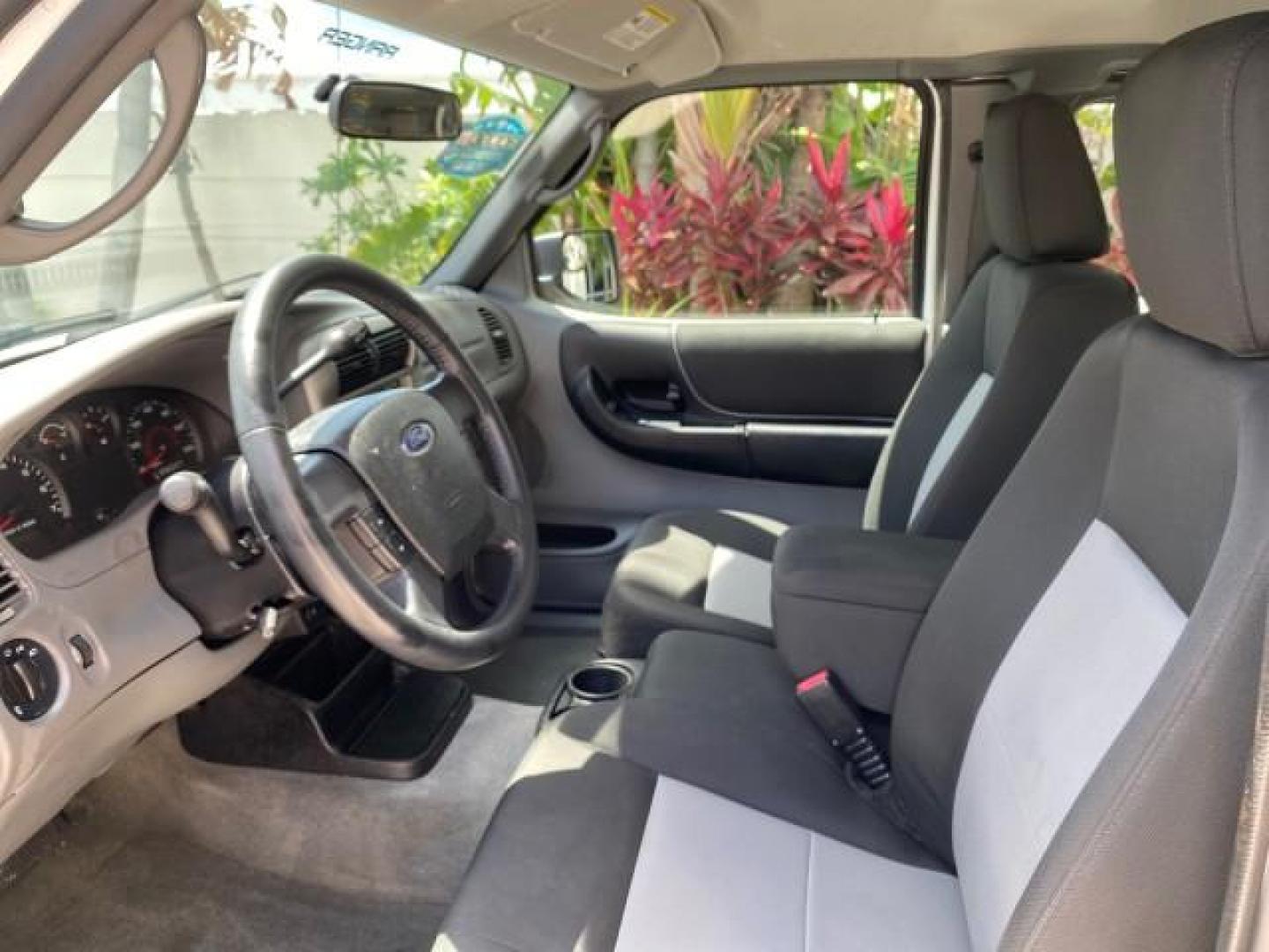2011 Oxford White /Medium Dark Flint Ford Ranger X CAB XLT LOW MILES 44,686 (1FTKR4EE4BP) with an 4.0L SOHC V6 Engine engine, Automatic transmission, located at 4701 North Dixie Hwy, Pompano Beach, FL, 33064, (954) 422-2889, 26.240938, -80.123474 - OUR WEBPAGE FLORIDACARS1.COM HAS OVER 100 PHOTOS AND FREE CARFAX LINK 2011 Ford Ranger XLT 4 Door Extended Cab Pickup 4.0L V6 F SOHC 16V Gasoline 21 MPG Rear Wheel Drive Features ABS Brakes Air Conditioning AM/FM Stereo Automatic Transmission Auxiliary Audio Input Bed Liner CD Audio Cloth Seats Crui- Photo#48